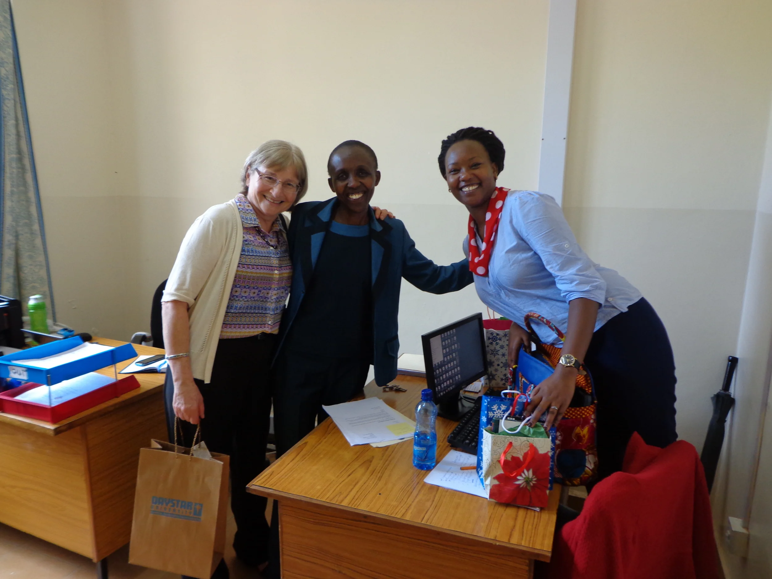 Mary with Jennifer Kinoti, and Barbara Ntoipo in the Student Finance Office on a trip to Daystar University in December 2015.