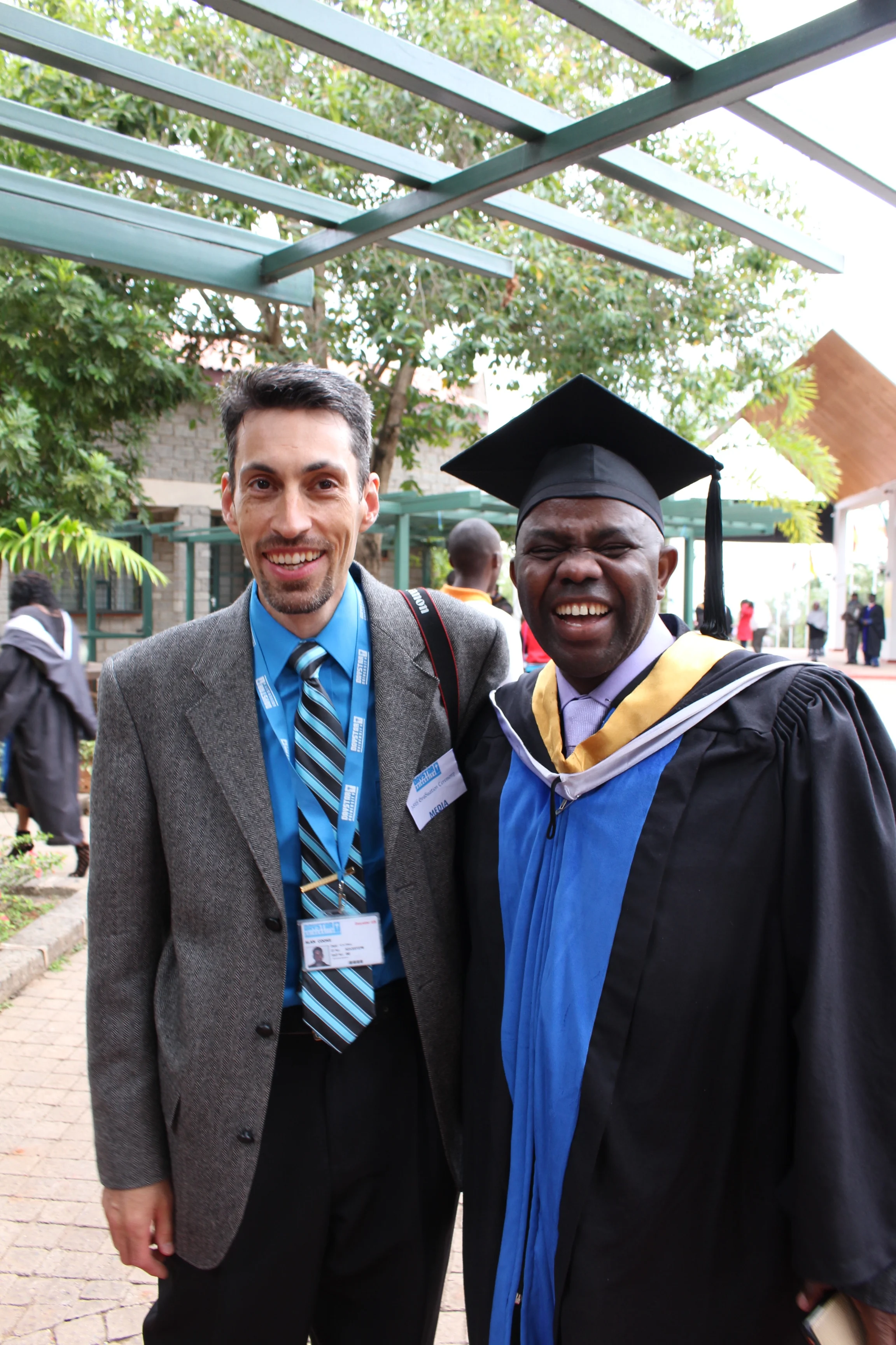 Alan Cooke, our Assistant Director, with his good friend Evariste at graduation.