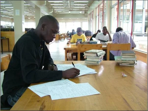 Give Page - Scholarships - student in library.jpg
