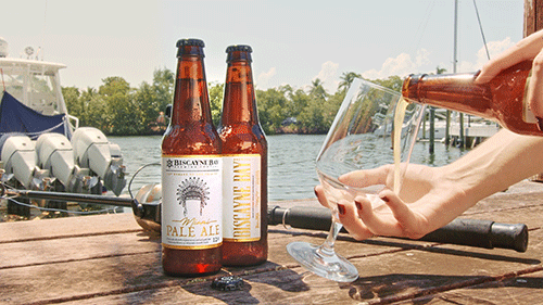 PALE-ALE-WITH-FISHING-ROD-POURING-INTO-GLASS.gif