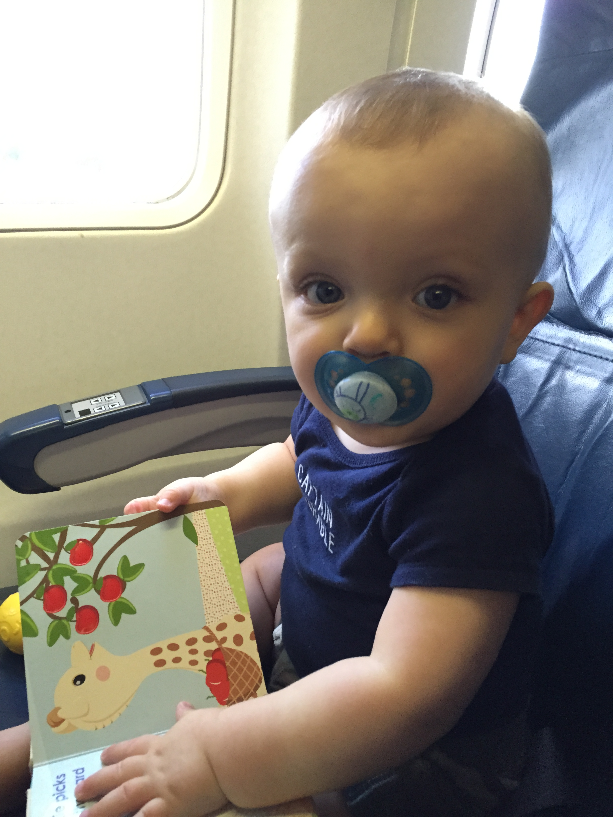 From flight #3 - the calm before the storm - hanging out in an empty seat before take-off...