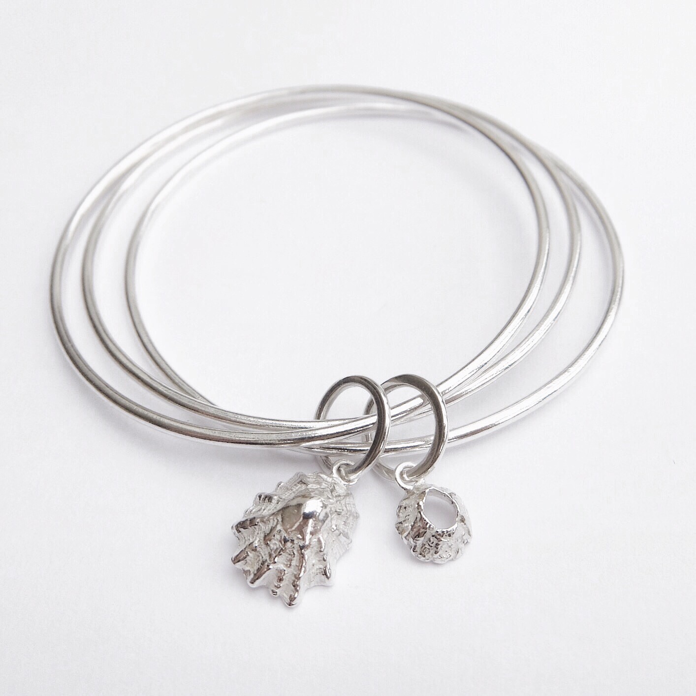 Barnacle and limpet sterling silver handmade bangle bracelet jasmine Bowden ocean inspired jewellery organic stacking bangles.jpg