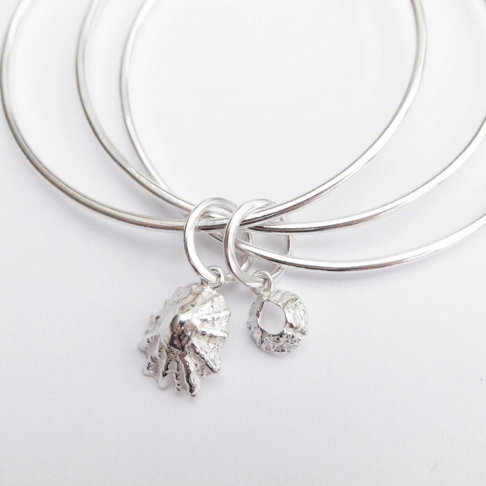 Barnacle and limpet sterling silver handmade bangle bracelet jasmine Bowden ocean inspired jewellery organic stacking bangles sculpture.jpg