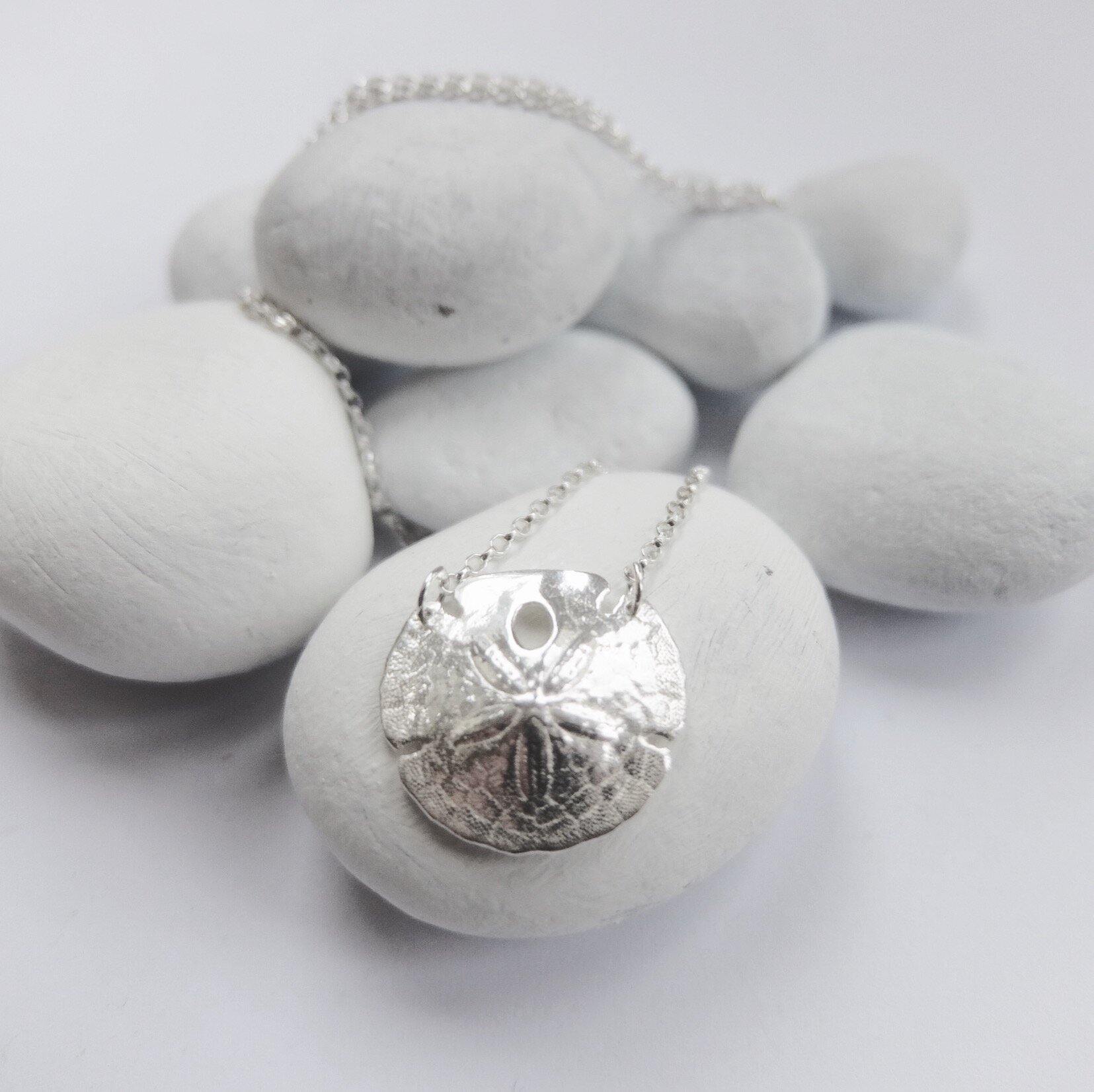 silver sand dollar necklace sterling silver pendant beach ocean sea inspired jewellery jewelry made in uk devon cornwall contemporary jeweller jasmine bowden shell surf bespoke 6.jpg
