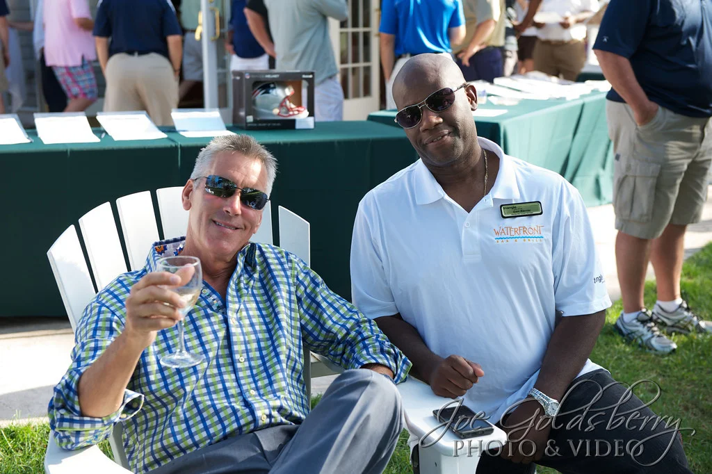 KISS 108's Billy Costa and a fan at Pinehills Golf Club in Plymouth, Mass.