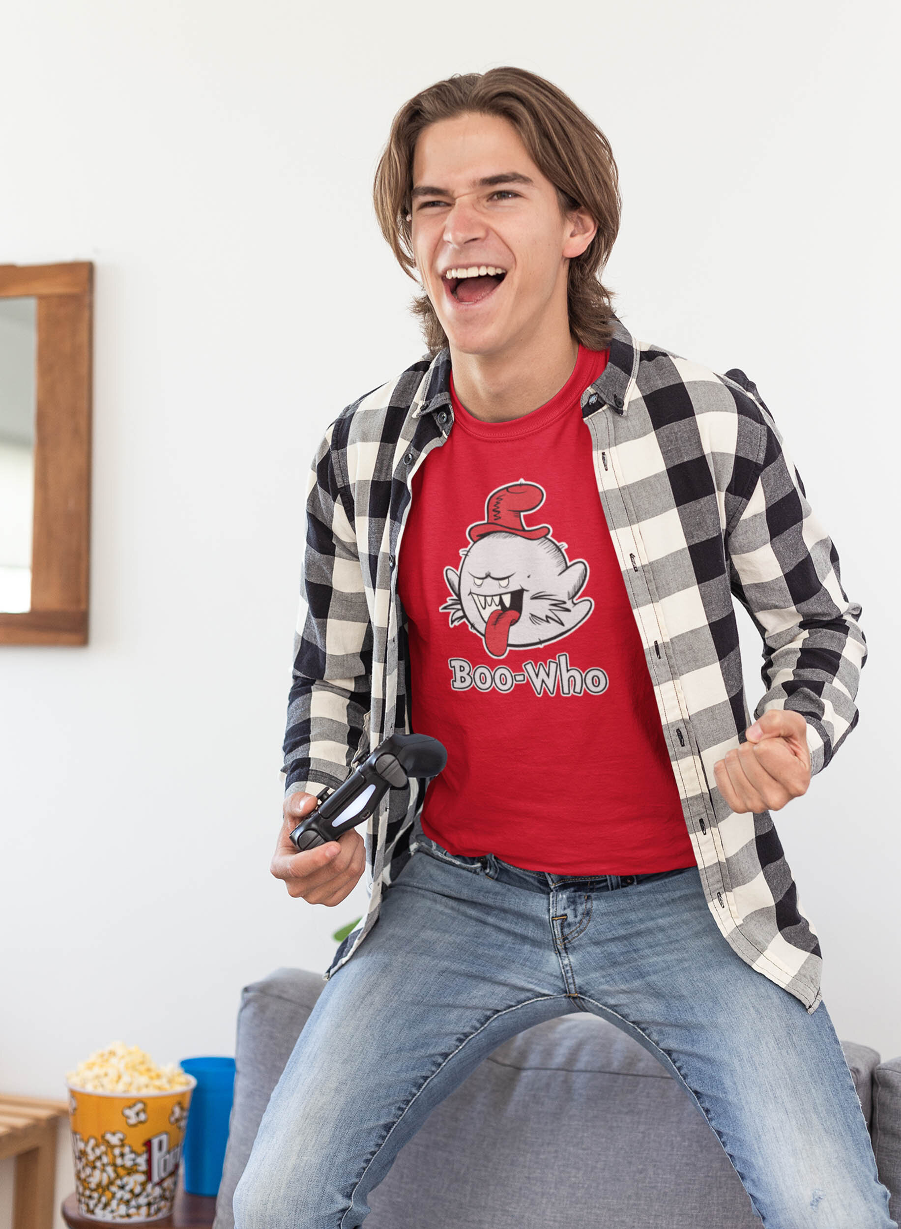t-shirt-mockup-of-a-thrilled-gamer-standing-on-his-couch-26897.jpg