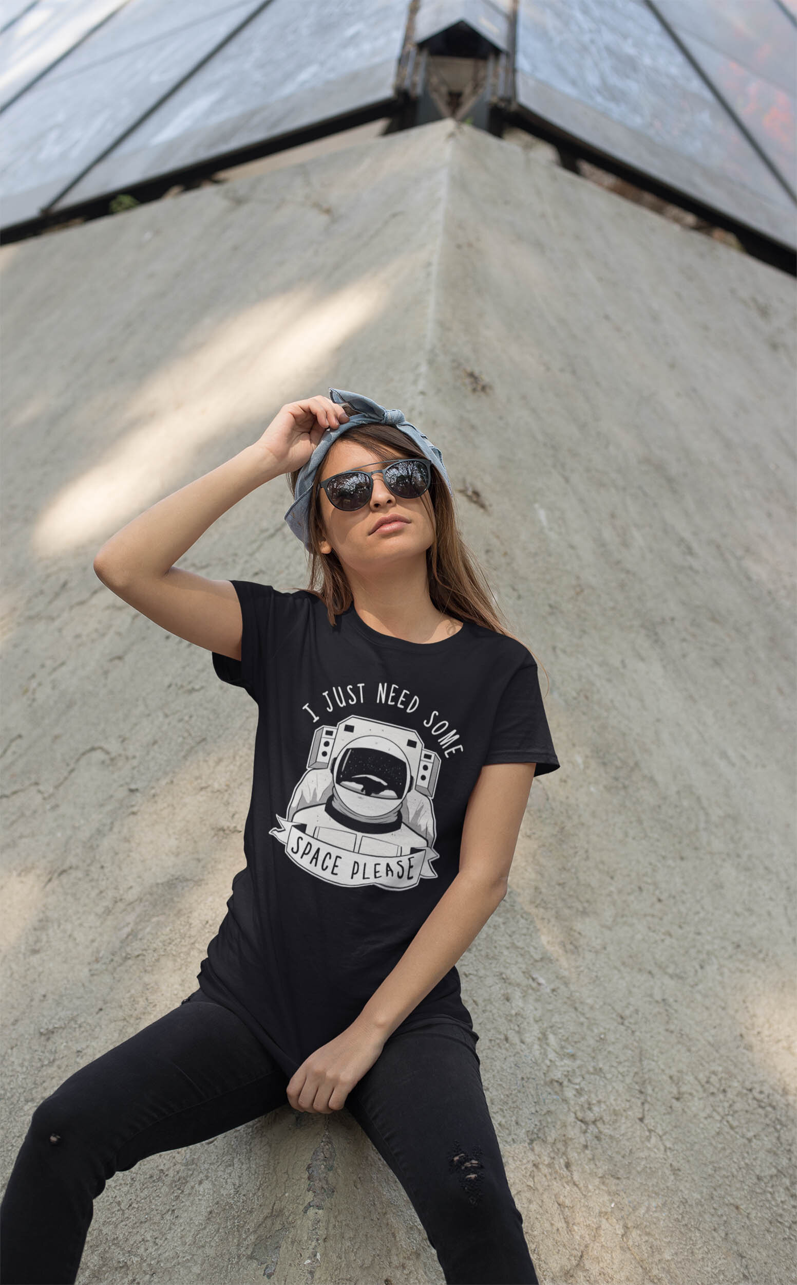 t-shirt-mockup-of-a-trendy-woman-with-sunglasses-leaning-over-a-concrete-structure-27340.jpg