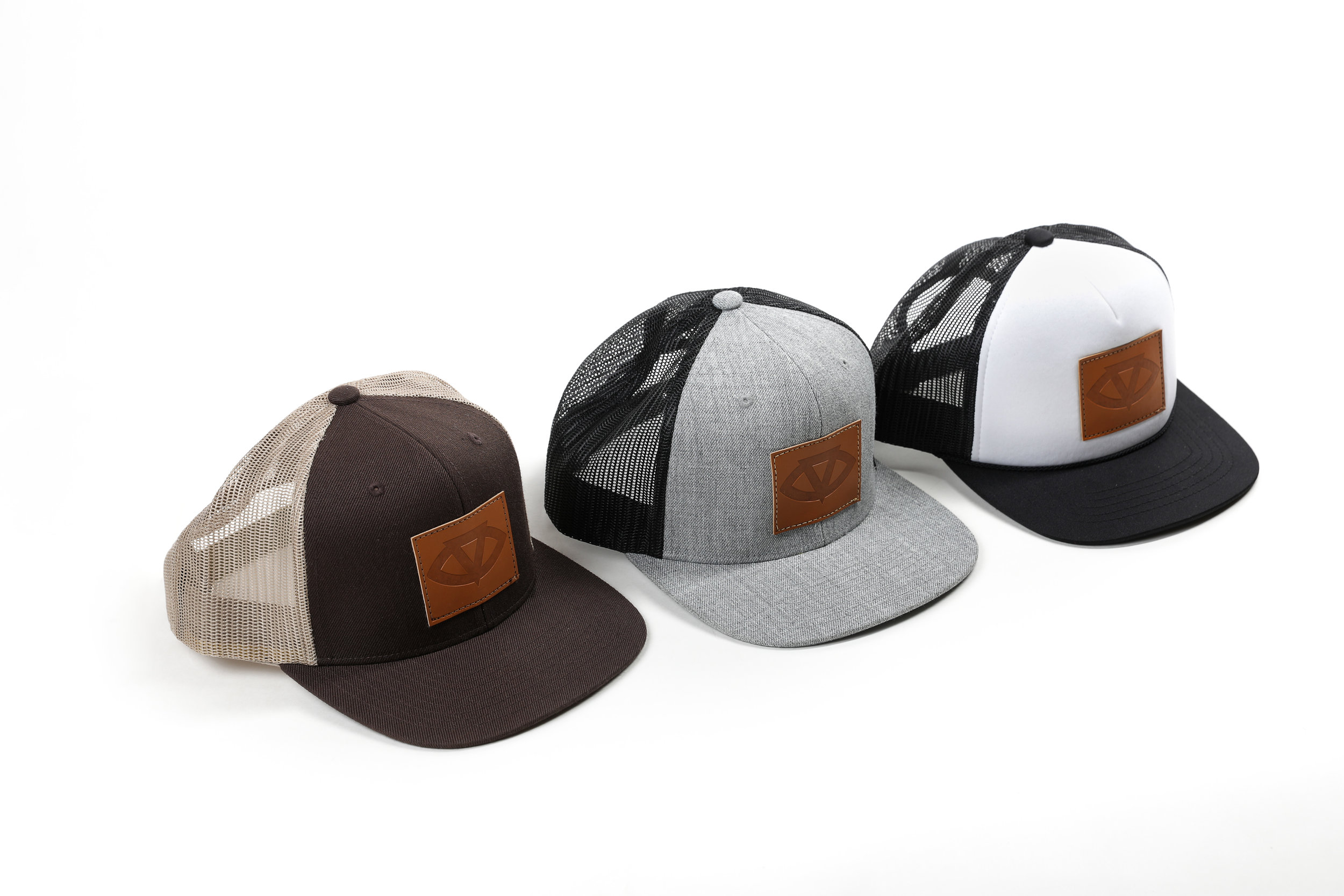 Trucker Snapbacks w/ Vegan Leather Patch