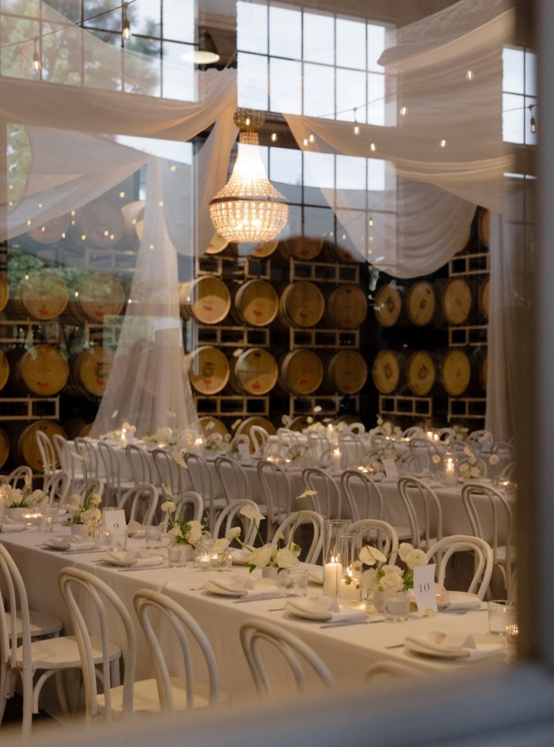 Venue: @stillwaterevents.love Photographer: @havenkimweddings #drapelife #bowerbirdpdx #portland #tbt #winecellar