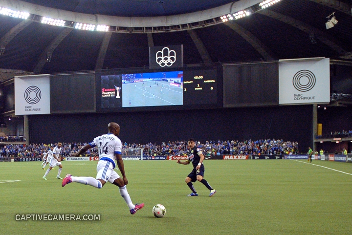   Montreal, Canada - April 29, 2015: Nigel Reo-Coker #14 of Montreal Impact prepares to send the ball down the field.  