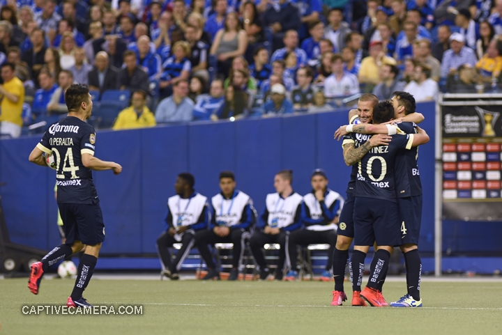   Montreal, Canada - April 29, 2015: Club America players celebrate the goal scored by Dario Benedetto in the 50th minute.  