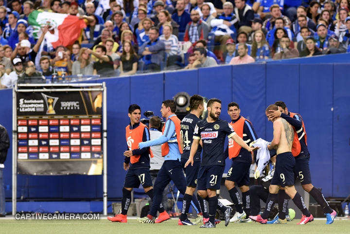   Montreal, Canada - April 29, 2015: Club America players celebrate the second goal scored by Dario Benedetto #9.  