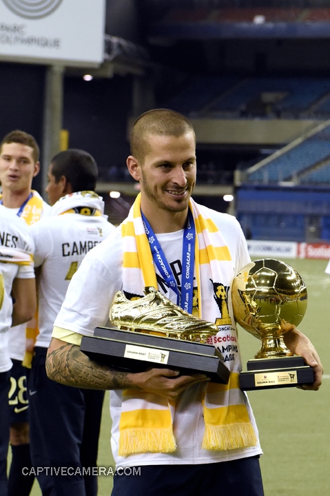 Montreal, Canada - April 29, 2015: Dario Benedetto of Club America displays the tournament Golden Boot and Golden Ball.