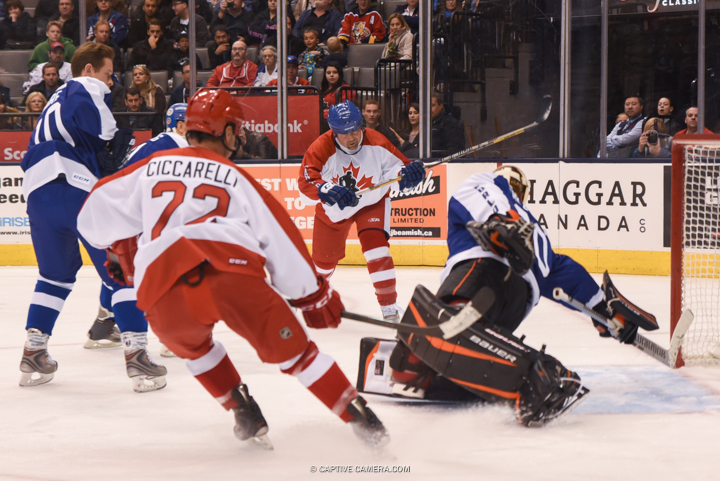  Nov. 8, 2015 (Toronto, ON) - Wendel Clark of Team Canada takes a backhand shot on Ilya Bryzgalov during the Haggar Hockey Hall of Fame Legends Classic at Air Canada Centre. 