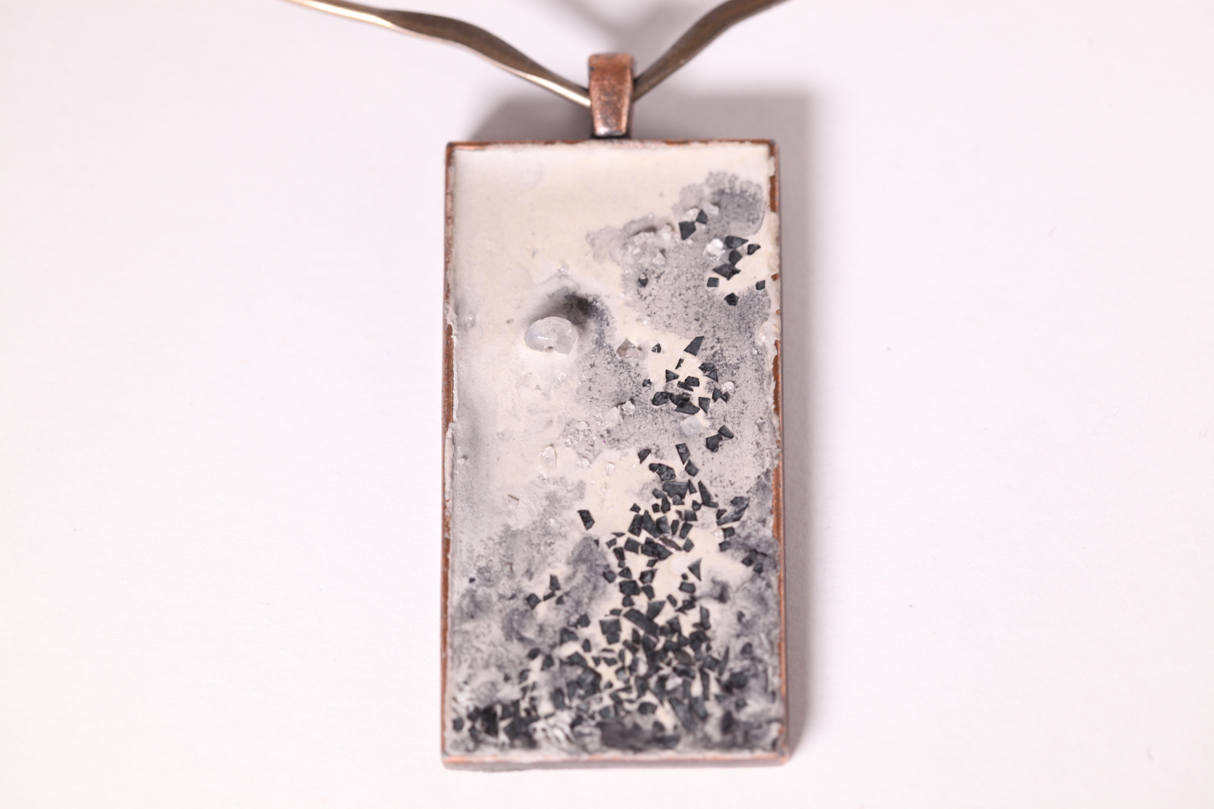 Metal Flakes and Moonstone set in Cement on Gunmetal Choker