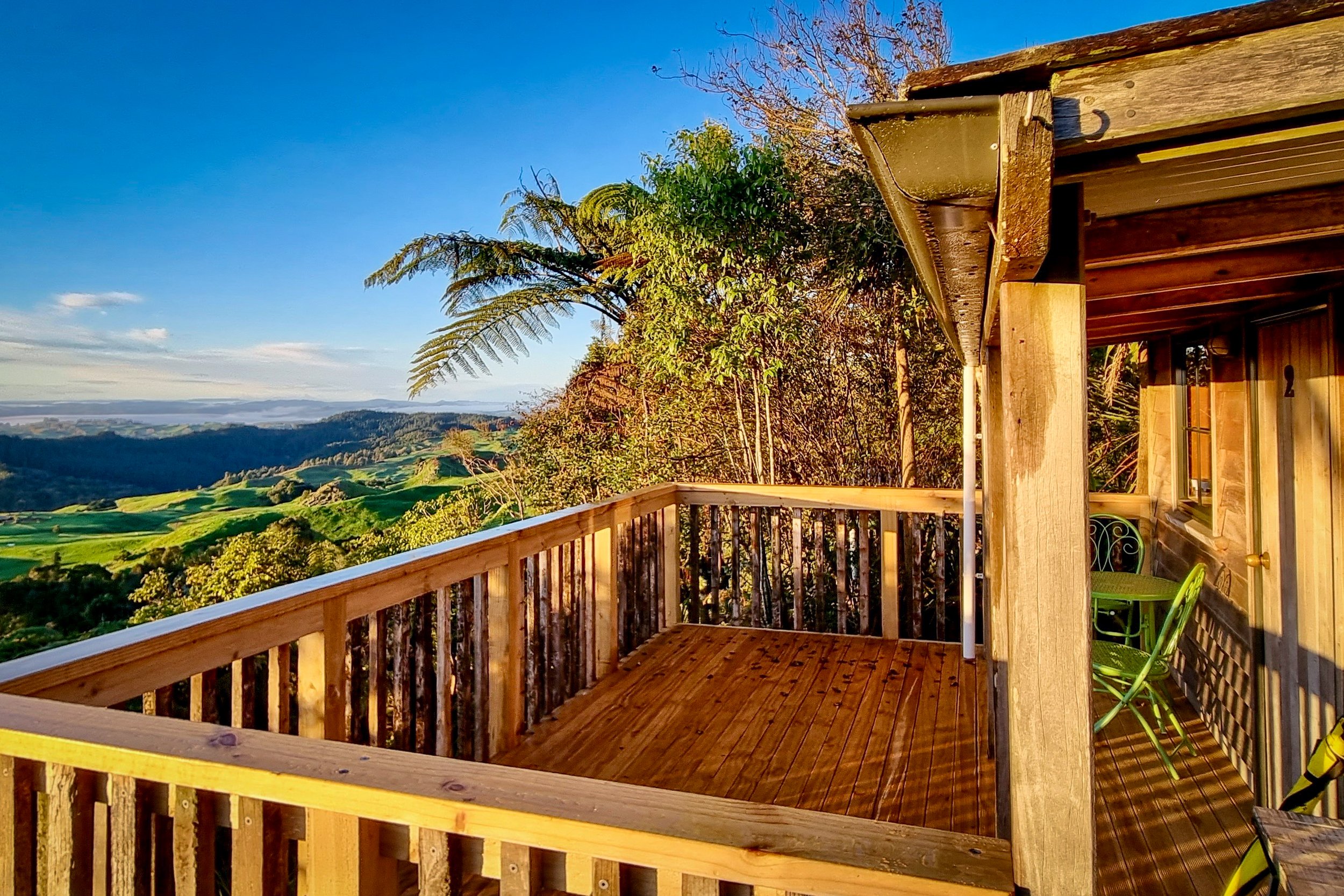 Te Tiro cottage deck view morning sun rise