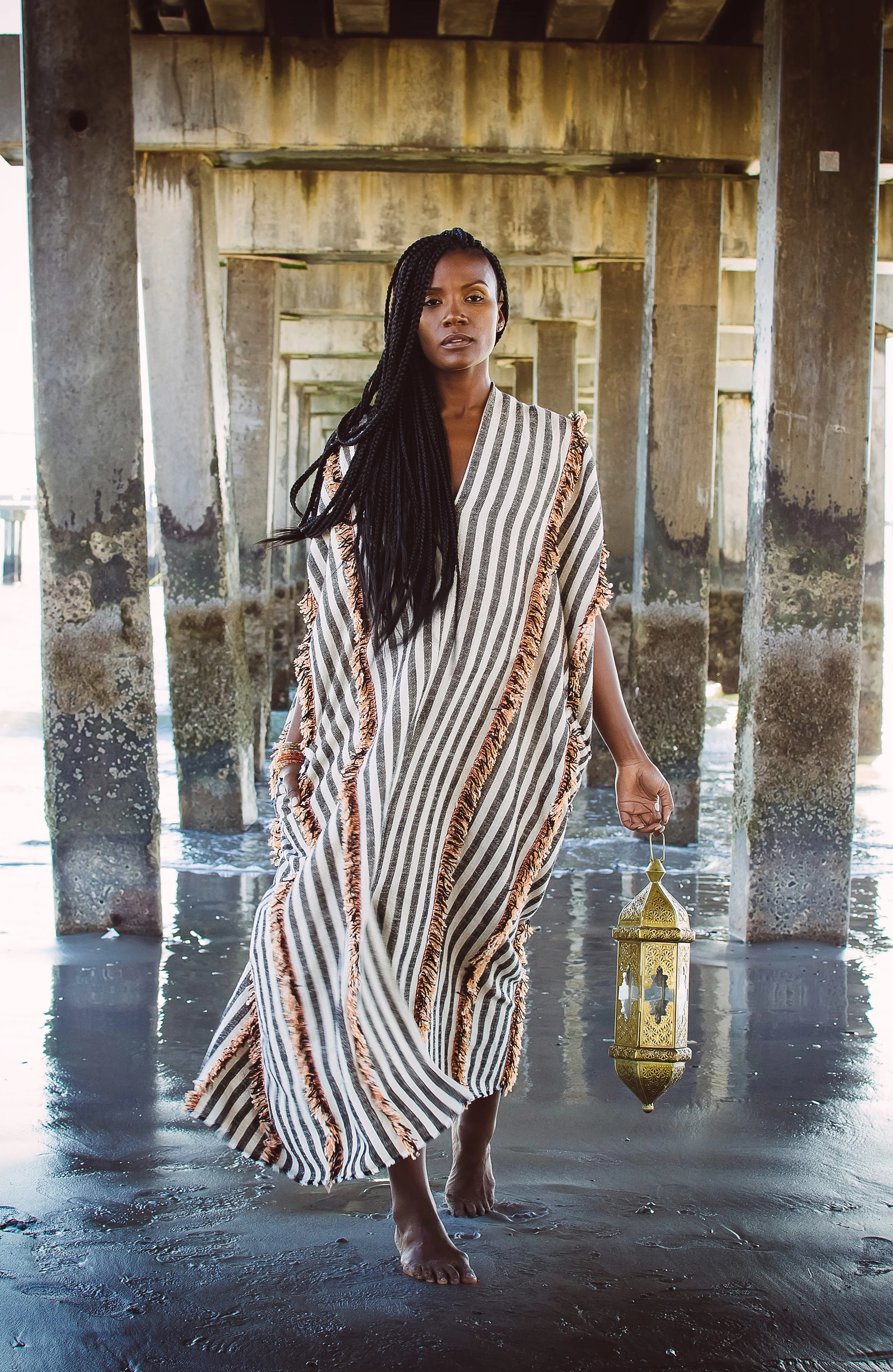 front cover ad of the •{nida}• kaftan from Printed Pattern People x majestic disorder for Restival capsule collection: #CityToSahara; modeled by Tulani Elisa; photography by ikeslimster.com