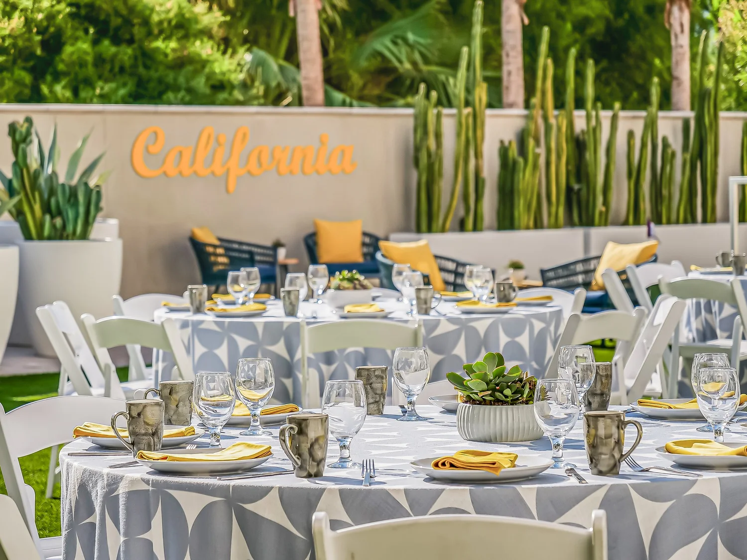 Outdoor event tables in a California courtyard