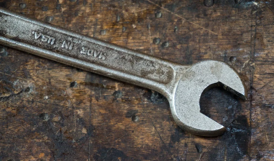 This wrench has been turned into a precision caliper for sizing the rung tenons