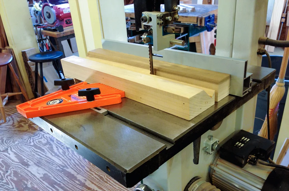 Another view of the v-block set-up on the band saw used to shape the rungs to an octagon