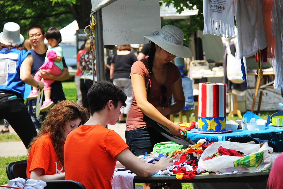 Visitors Make Costumes at the Theatre Arts Tent