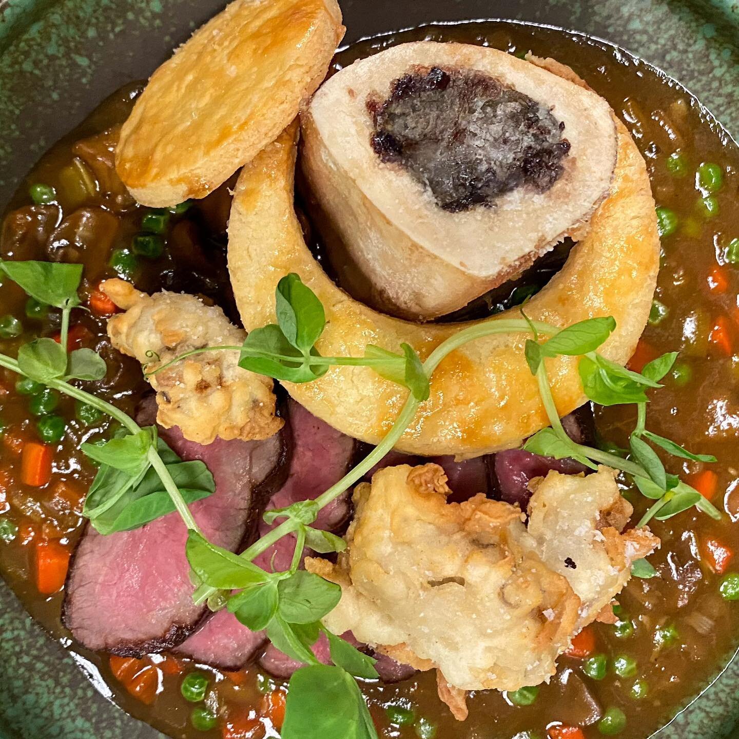 &ldquo;Steak &amp; Oyster Pie&rdquo; is on this weekend - Pan roasted striploin, chicken fried oysters, roasted marrow bone, oyster stout &amp; beef stew. Unconventional, so delicious and ummm&hellip;Chicken fried oysters!! 
.⁣
#comfortfood #dinner #