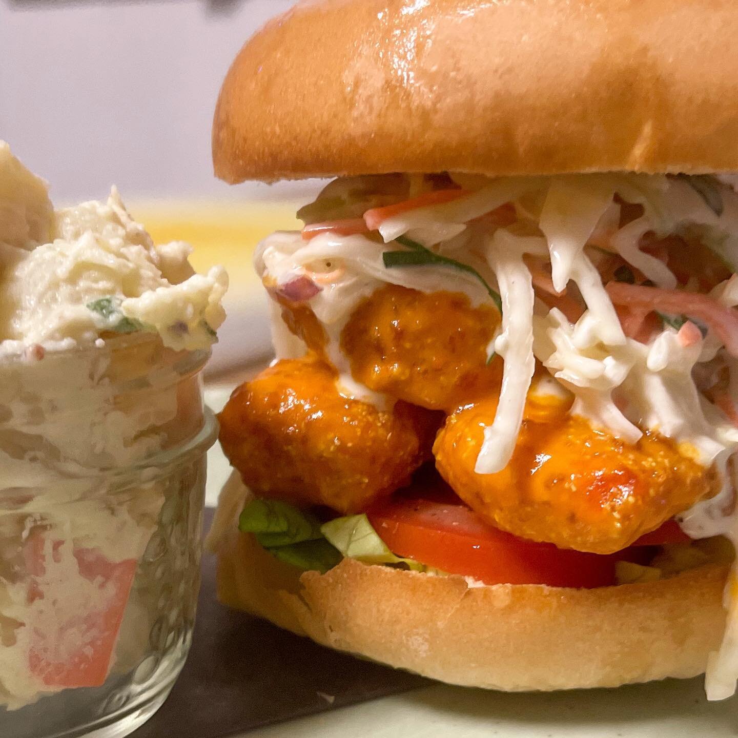 Today&rsquo;s po-boy - Buffalo cod with blue cheese slaw. &amp; It&rsquo;s Monday which means all day Oyster and Mussel happy hour!! 
.
Our lunch po-boys change frequently! Always on the menu 11:30-4 daily. 
.
#poboy #lunchfeature #freshcod #housemad