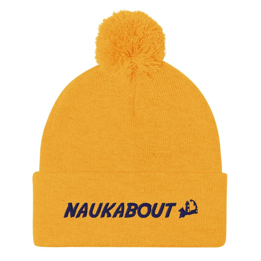 pom-pom-knit-cap-gold-front-6ae0d6e339916.jpg
