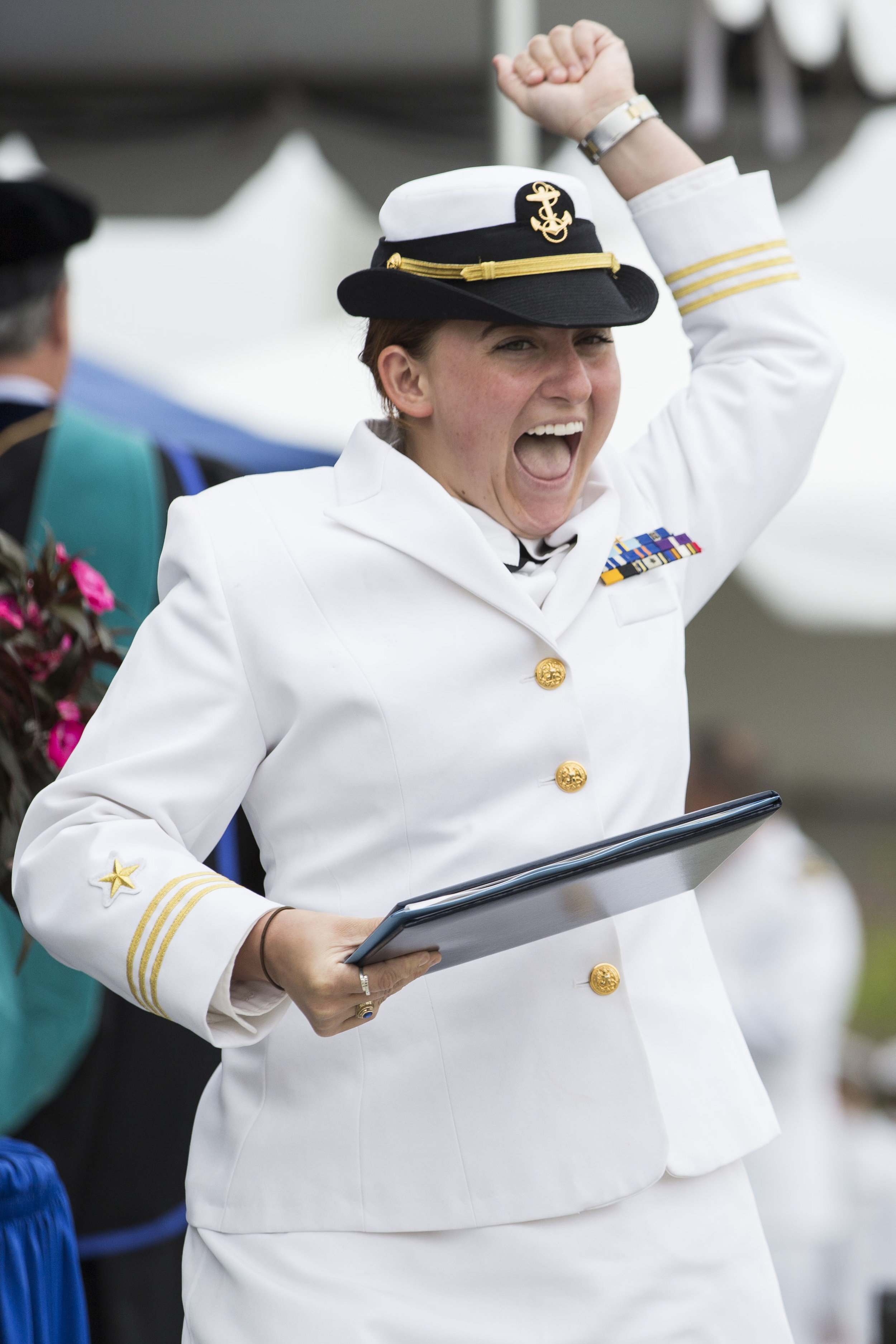  Natalie Lu celebrates after accepting her diploma during the Massachusetts Maritime Academy Commencement ceremony on June 17, 2017. 