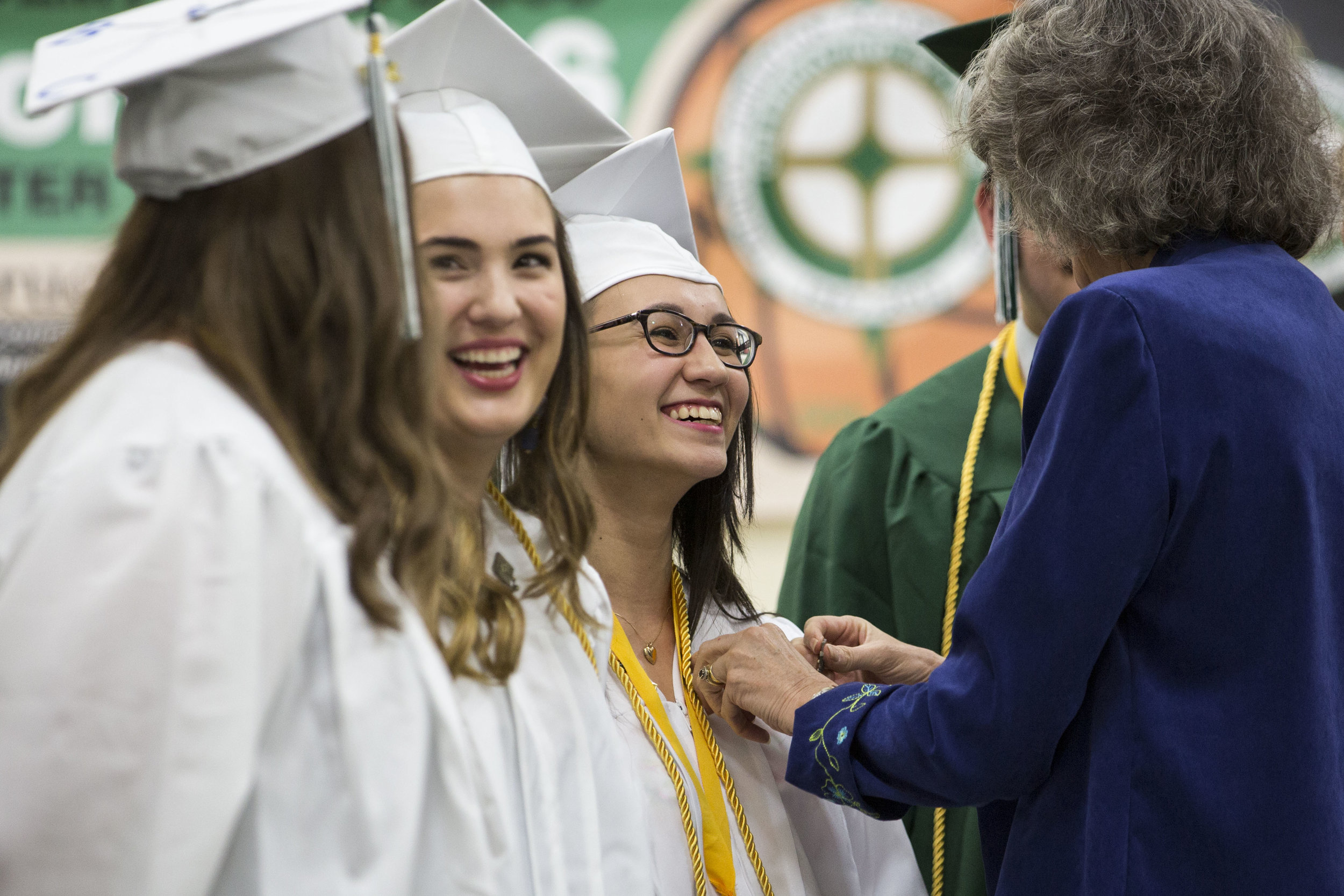  Trinity Christian Academy senior Nicole Valli receives her alumni pin during the graduation ceremony on June 11, 2017. 