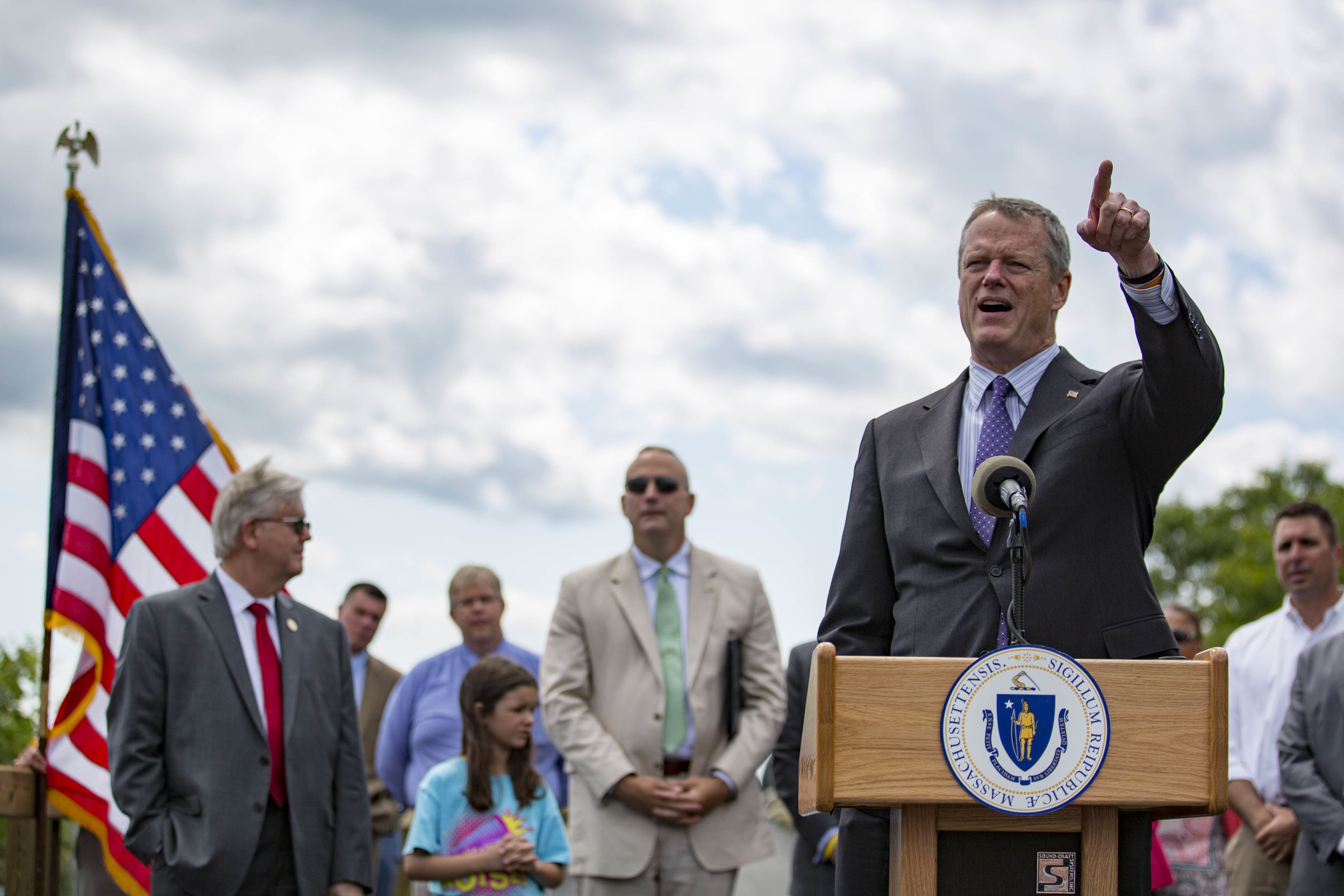  Governor Charlie Baker addresses the crowd at the opening of the Cape Cod Rail Trail extension off of route 134 in South Dennis on June 28, 2017. 