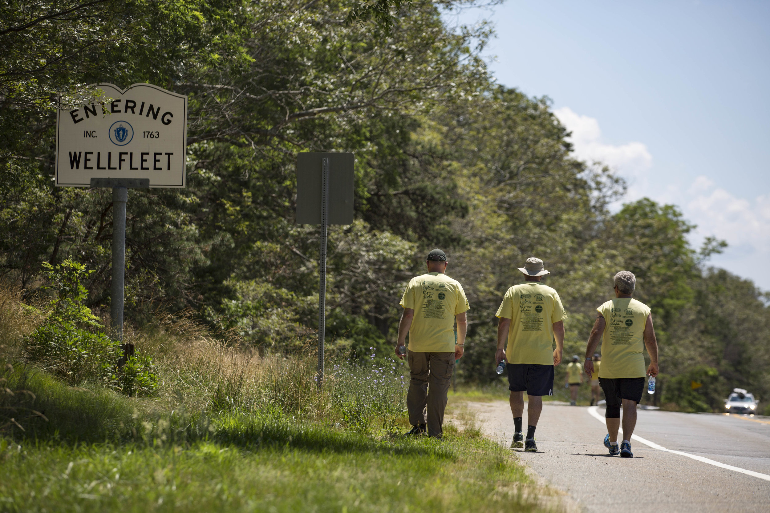  Jay Coburn, Liam Cahill and Richard Waystack walk along route 6 during the Housing with Love Walk on July 10, 2017. This is a seven-day walk spanning the length of Cape Cod, from Provincetown to Falmouth. 