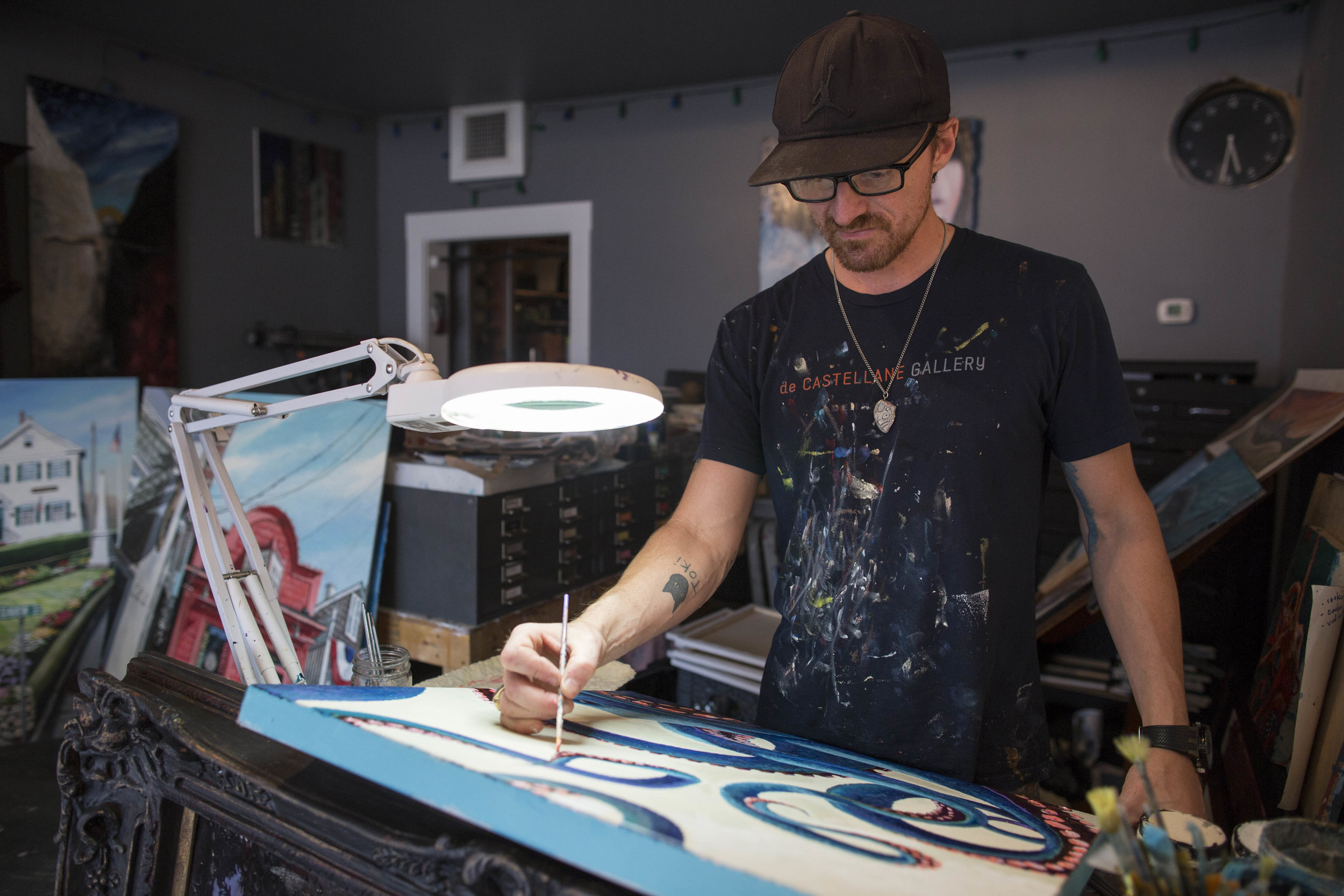  Hans de Castellane works on a piece in his studio on Main Street in Dennis Port on July 15, 2017. The Dennis Port Revitalization Committee has asked de Castellane to paint a third mural in downtown Dennis Port. 