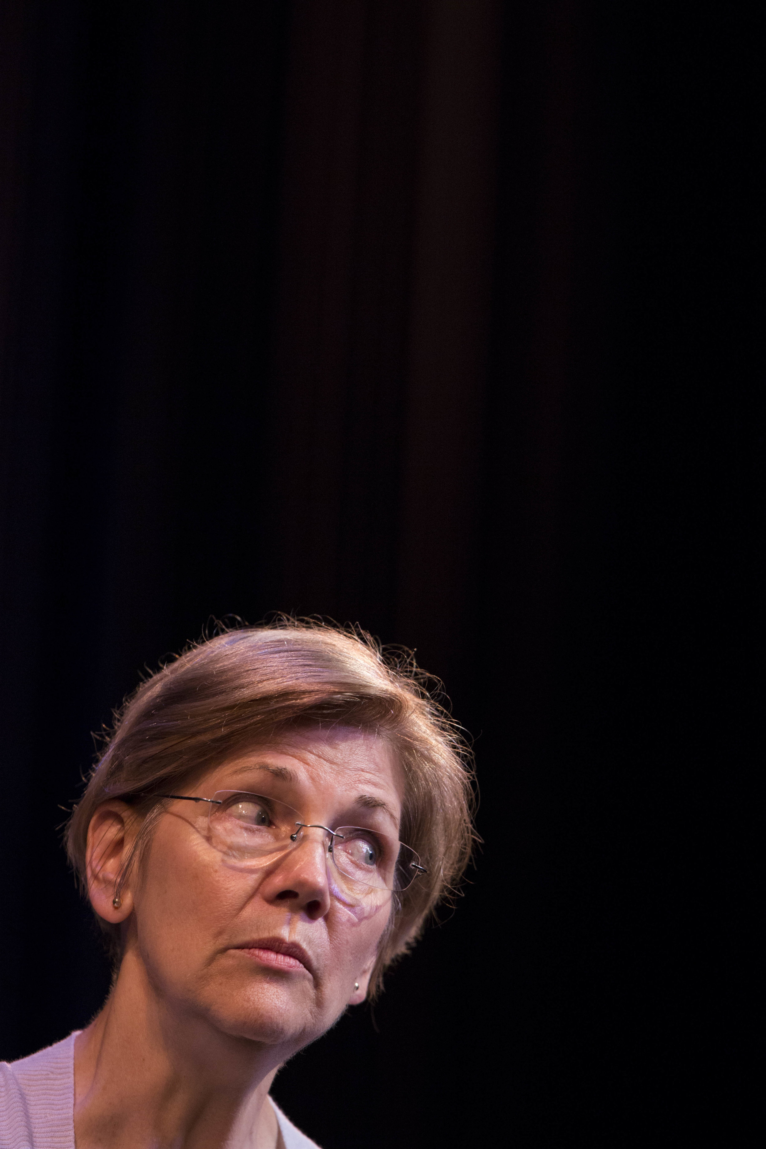  Senator Elizabeth Warren answers questions from the audience at the town hall-style meeting in the Tilden Arts Center at Cape Cod Community College on July 16, 2017. 
