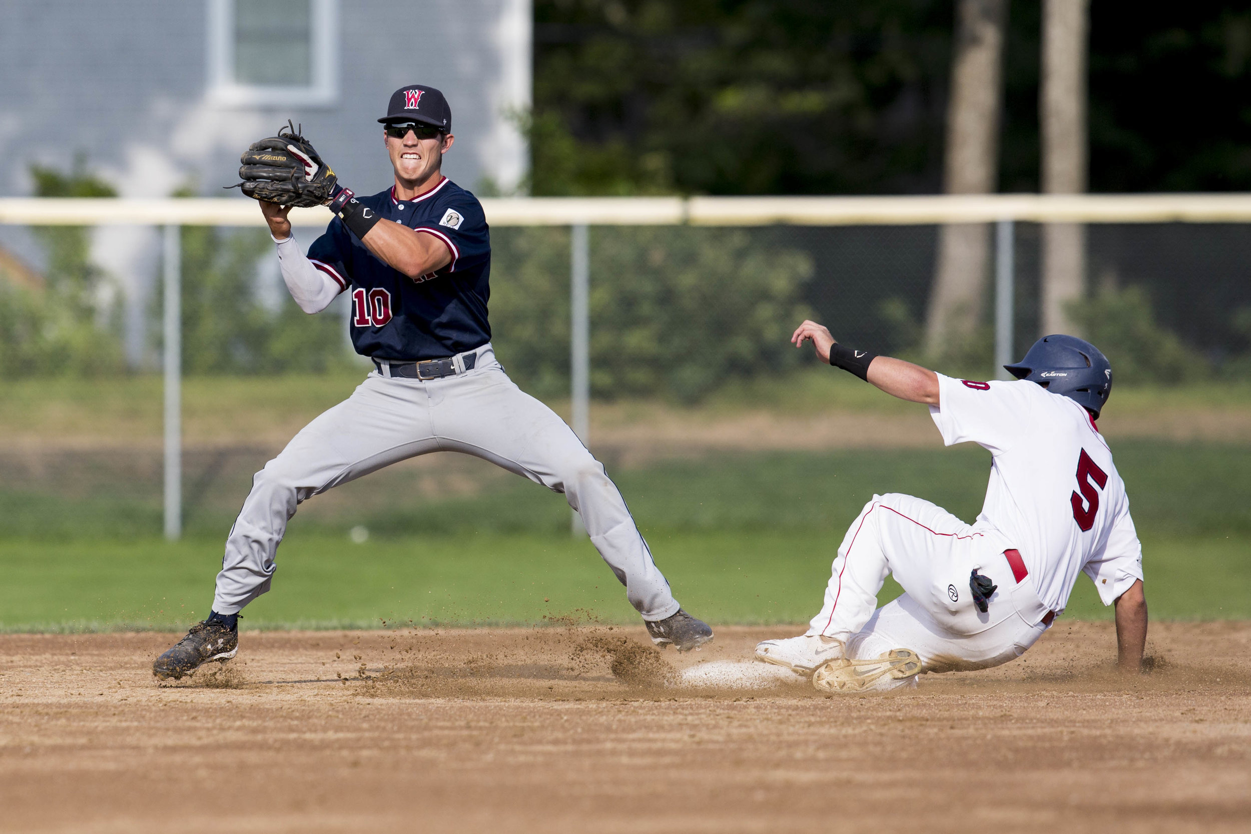  Carter Pharis slides to second as Jarren Duran attempts to get him out during the Yarmouth-Dennis Red Sox home game against the Wareham Gatemen on July 23, 2017. Pharis was called safe at second. 