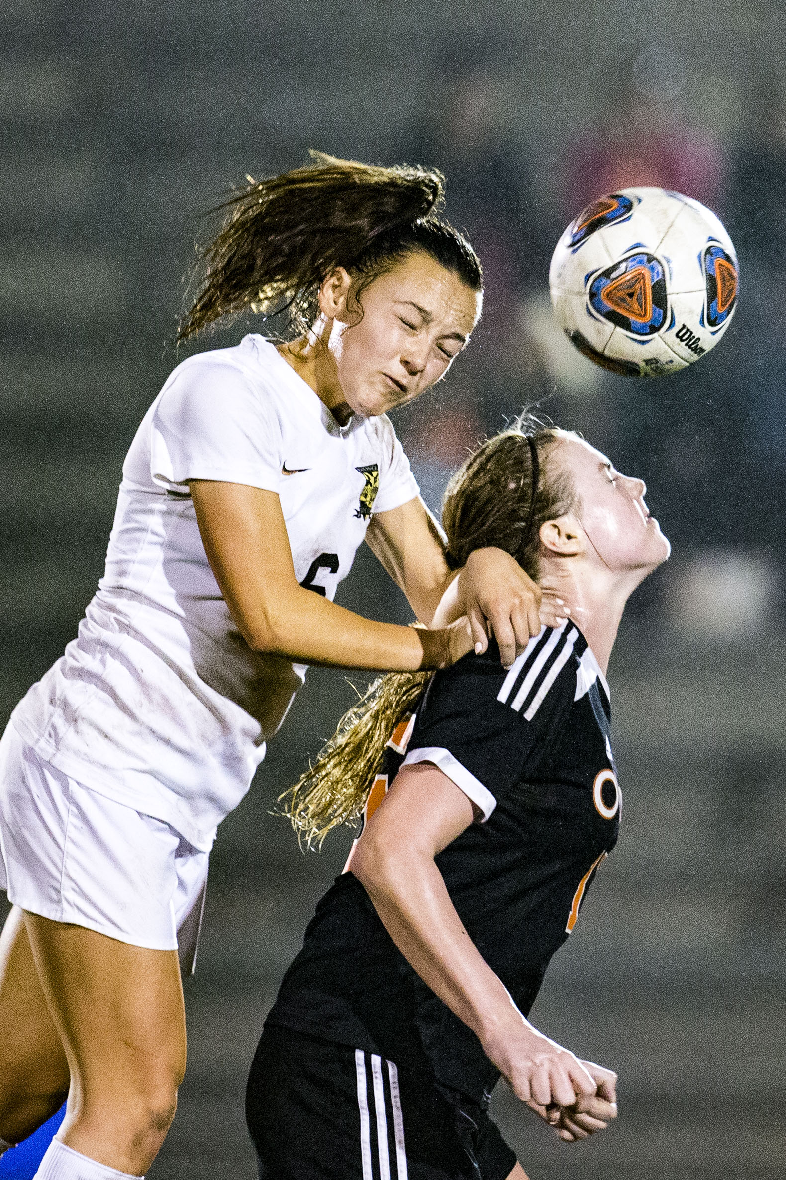  Buchholz's Natalie Johnson pushes off of an Oviedo player to head the ball during the match at Citizens Field on February 13, 2018. Buchholz High lost 0-2 to Oviedo High. 