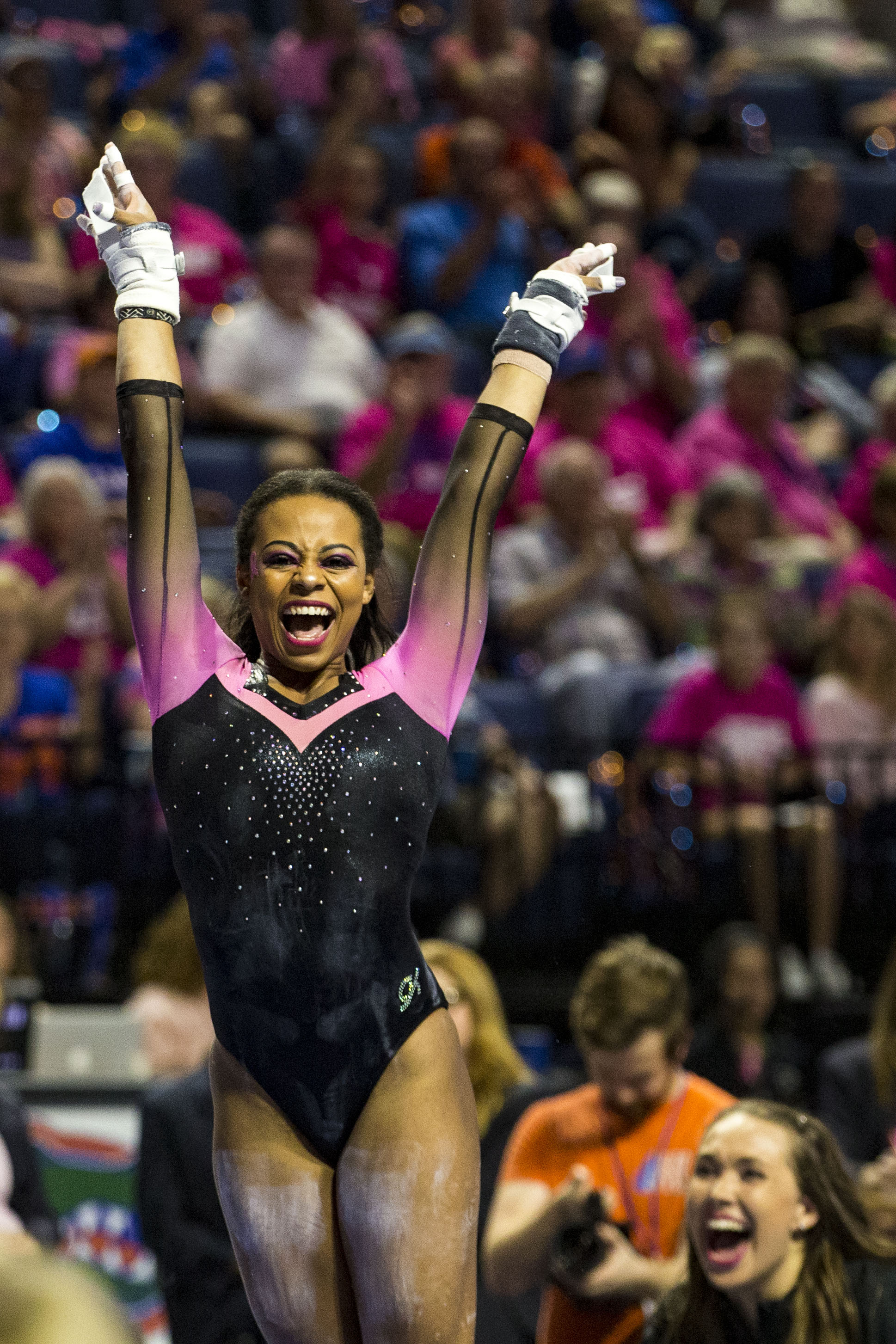  Florida Gator Kennedy Baker celebrates after competing in the uneven bars during the match against Arkansas on February 23, 2018. The Gators beat Arkansas 197.725-196.875.&nbsp; 