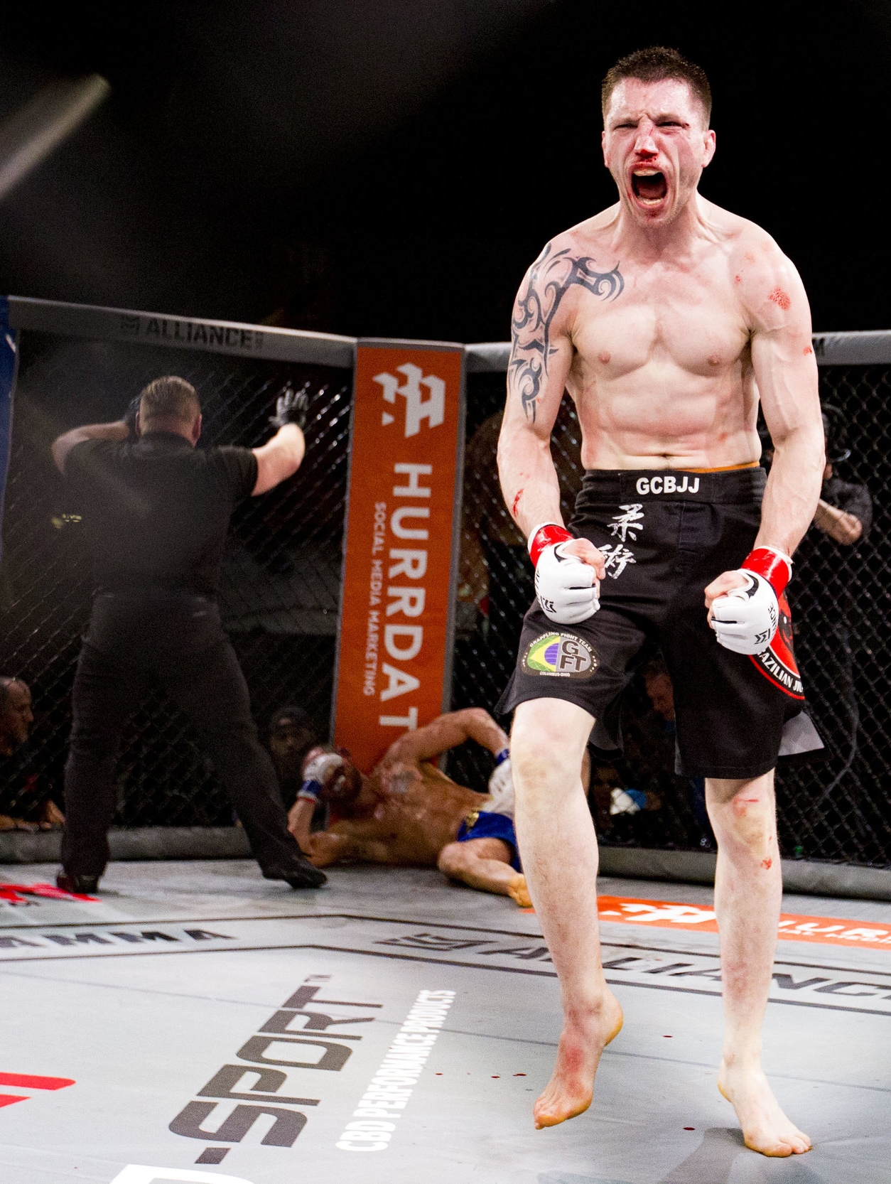  An MMA fighter celebrates after his knockout win during the Alliance MMA competition at the Arnold Sports Festival in Columbus, Ohio on March 3, 2018. 