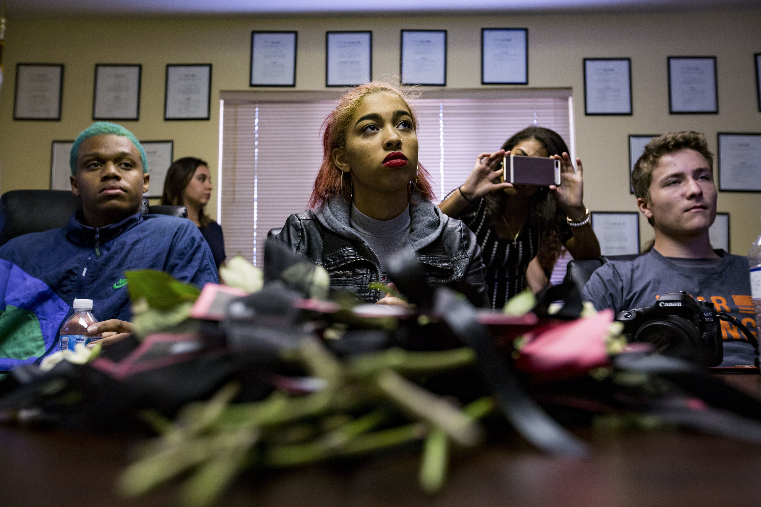  Left to right, Gainesville High senior Bryan Jackson, Gainesville High senior Paige Wearrien and Eastside High junior Max Asseng Skype with Congressman Ted Yoho after a protest on March 14, 2018. Students across the country walked out of school in a