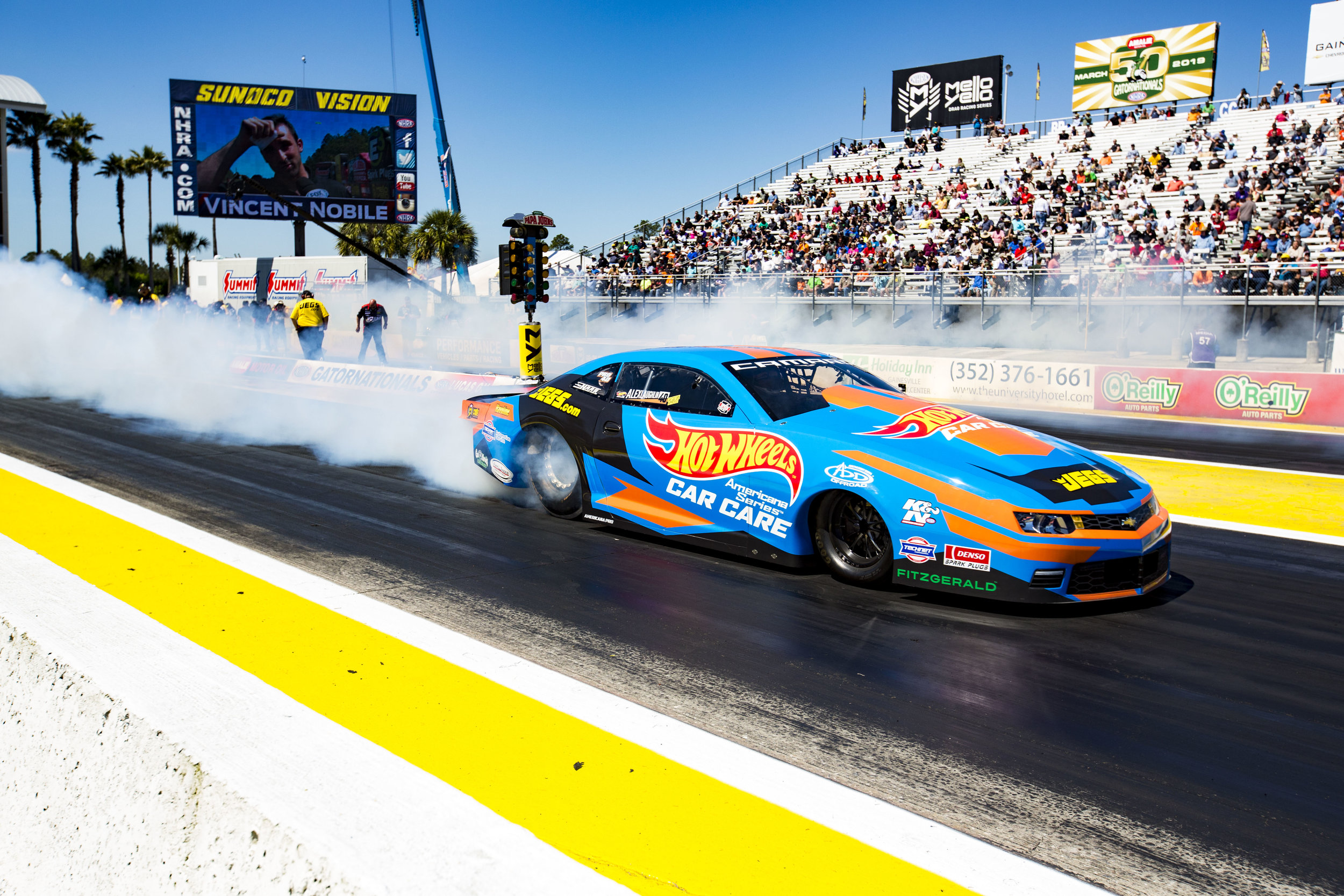  A driver reverses into the starting line during the NHRA drag racing competition at the Gainesville Raceway on March 16, 2018. 