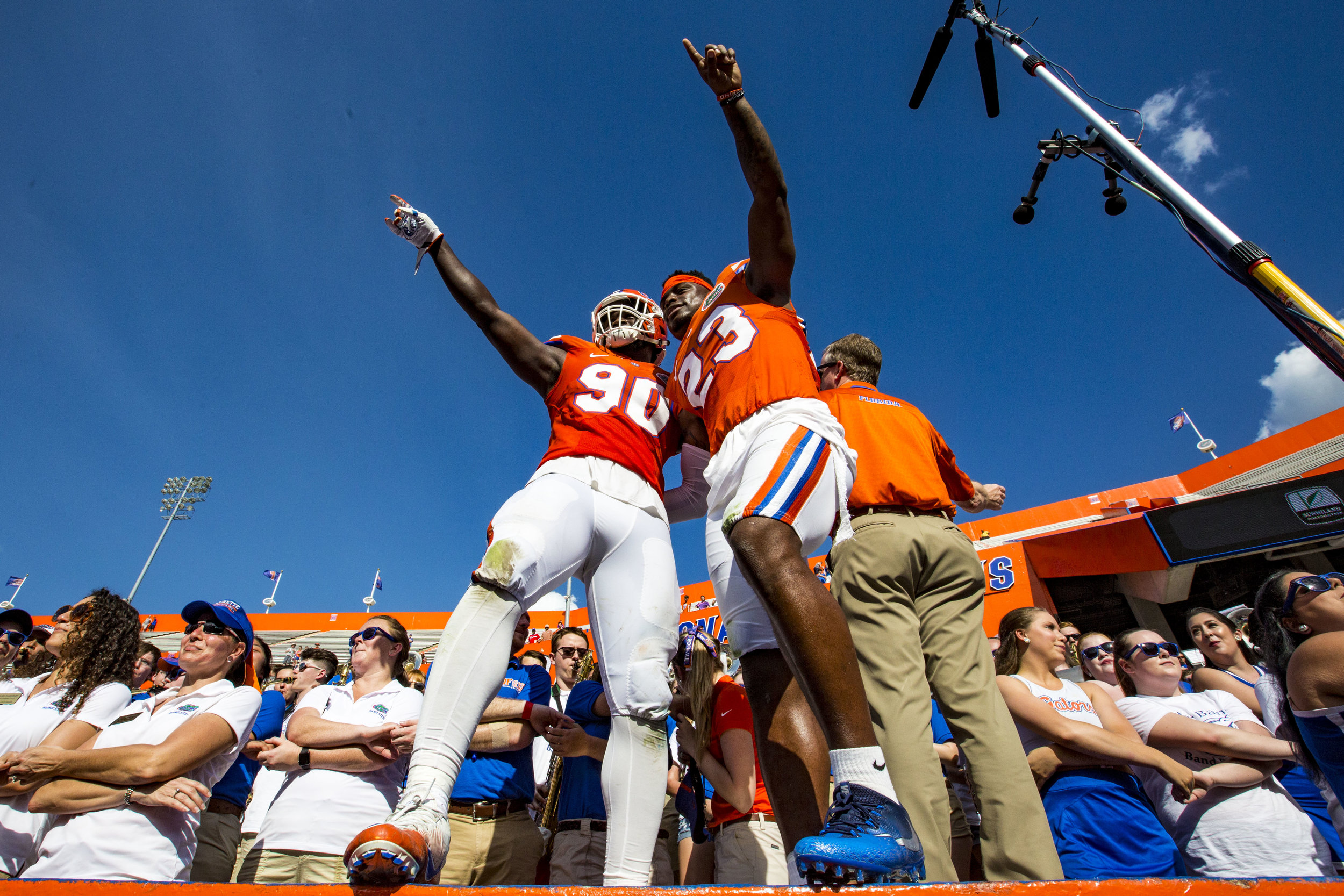  Florida Gators defensive lineman Antonneous Clayton and Florida Gators defensive back Chauncey Gardner-Johnson celebrate after the Orange and Blue spring football game on April 14, 2018. Blue beat Orange 35-30.&nbsp; 