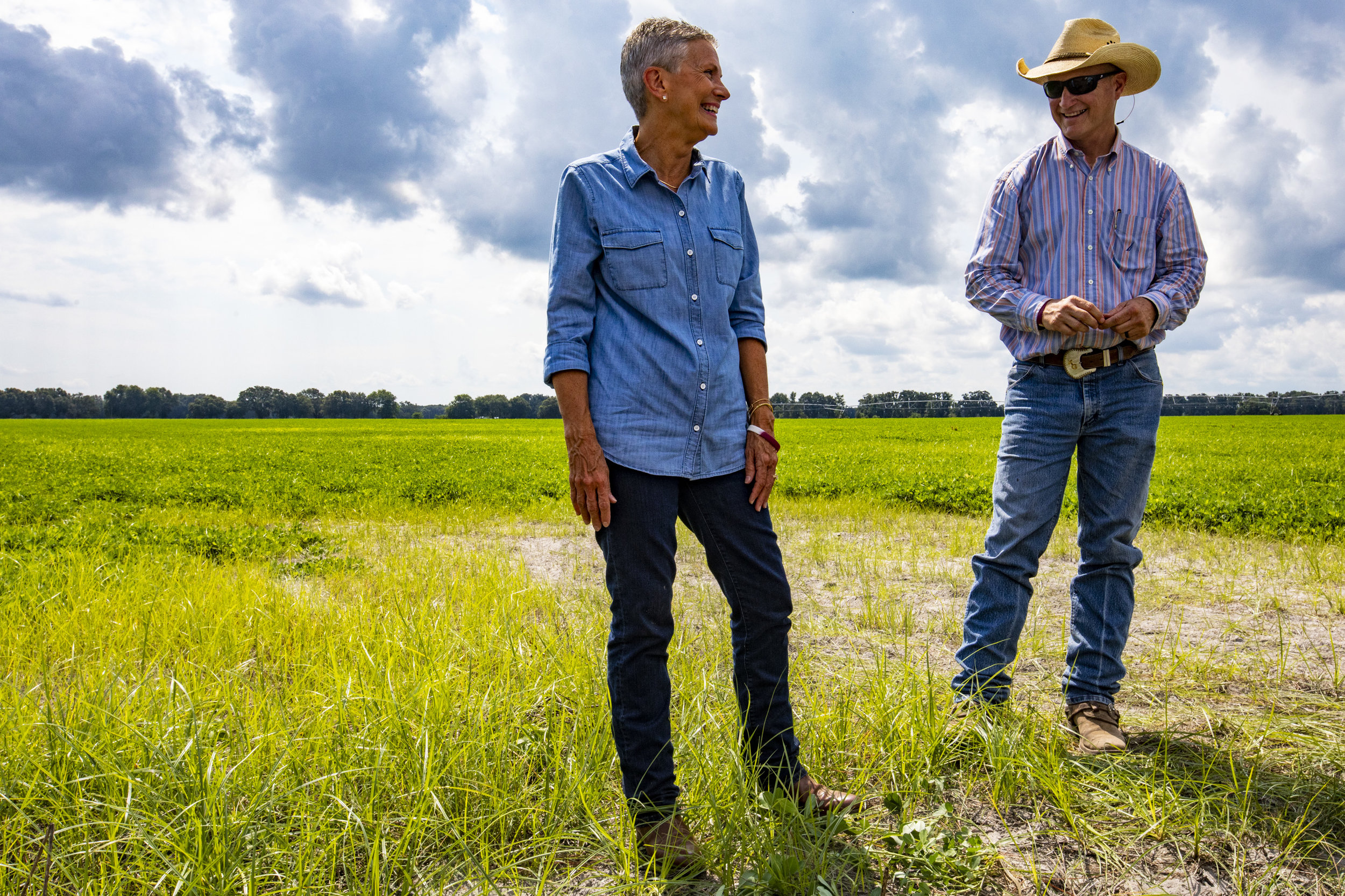  Lynetta Usher Griner and Ken Griner laugh at each other while standing in a peanut field outside of a timber harvest site on July 12, 2018. Lynetta Usher Griner was recently named the 2018 Florida Farmer of the Year by the Florida Farm Bureau Federa