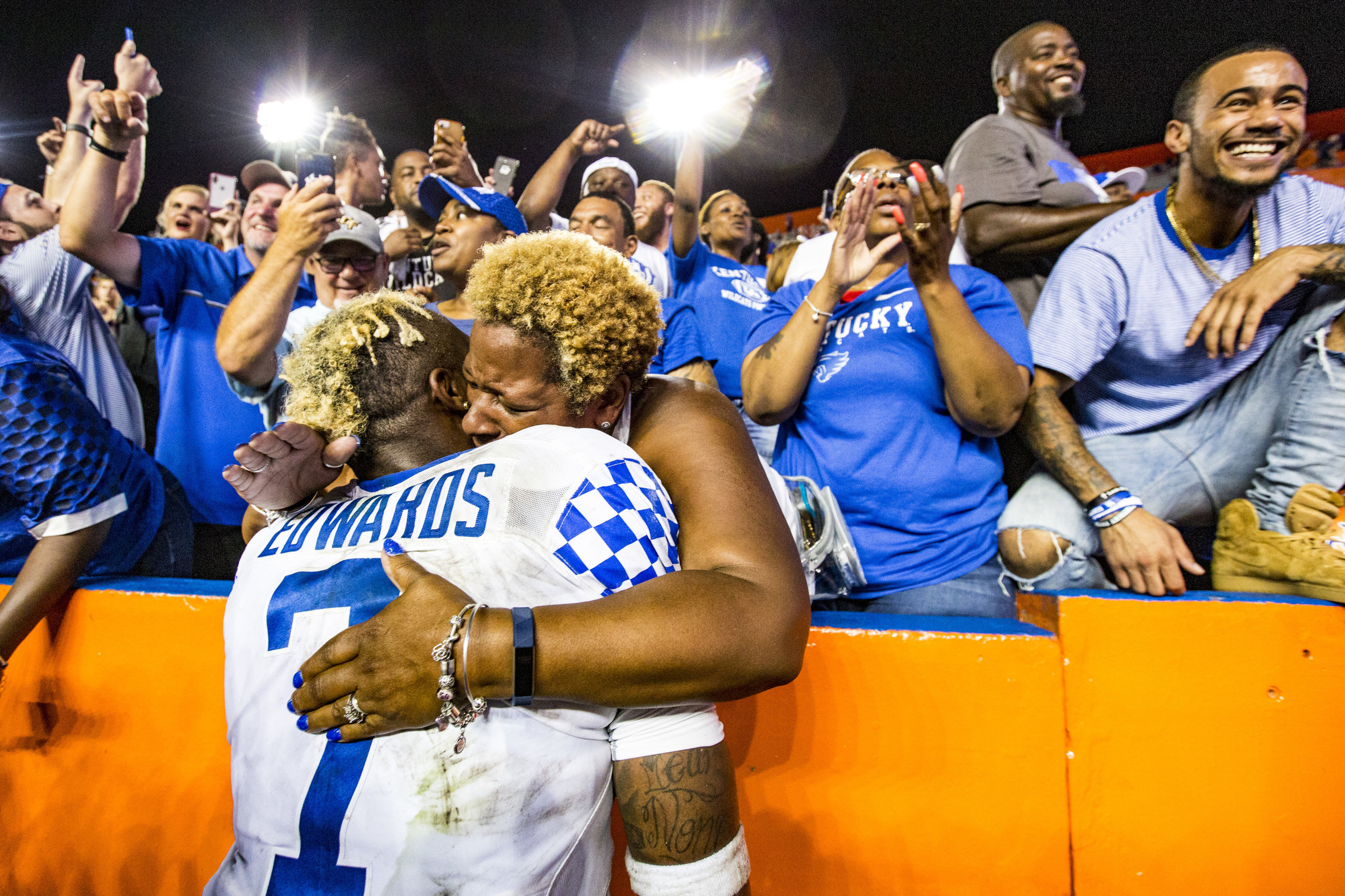  Kentucky Wildcats safety Mike Edwards (7) is hugged by fans after their game against the Florida Gators on September 8, 2018. The Kentucky Wildcats beat the Florida Gators 27-16, securing their first win over Florida in 32 years. 