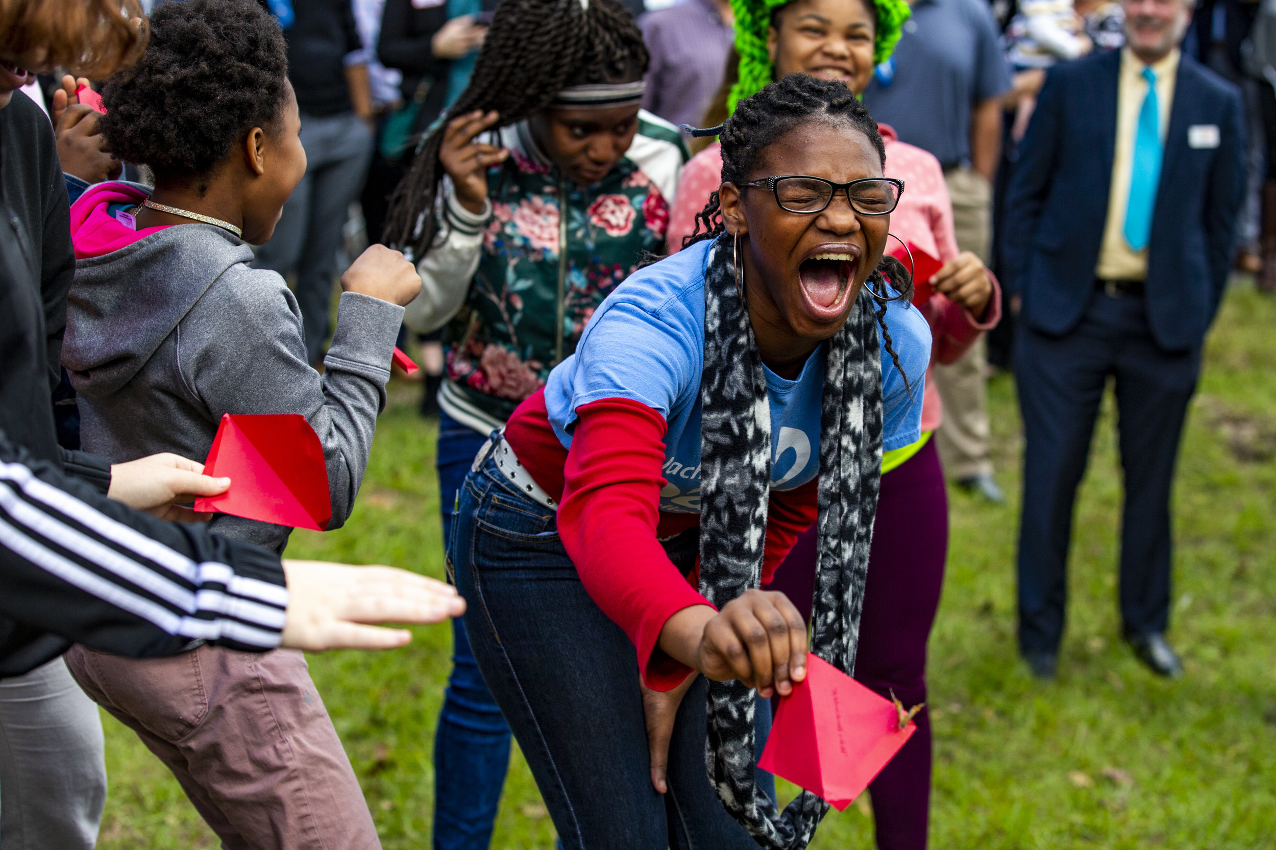  Girls scream in delight as they release butterflies during the ribbon cutting ceremony for the PACE Center for Girls' new "Butterfly Center" on January 22, 2019. 