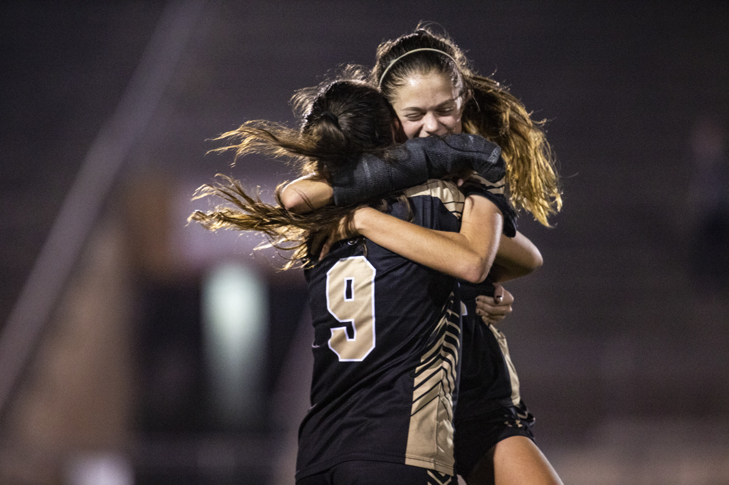  Buchholz's Victoria Schuh hugs Kate Johnson after the Class 5A girls soccer playoff game at Citizens Field on February 5, 2019. The Buchholz Bobcats won 1-0 over Flagler Palm Coast. 