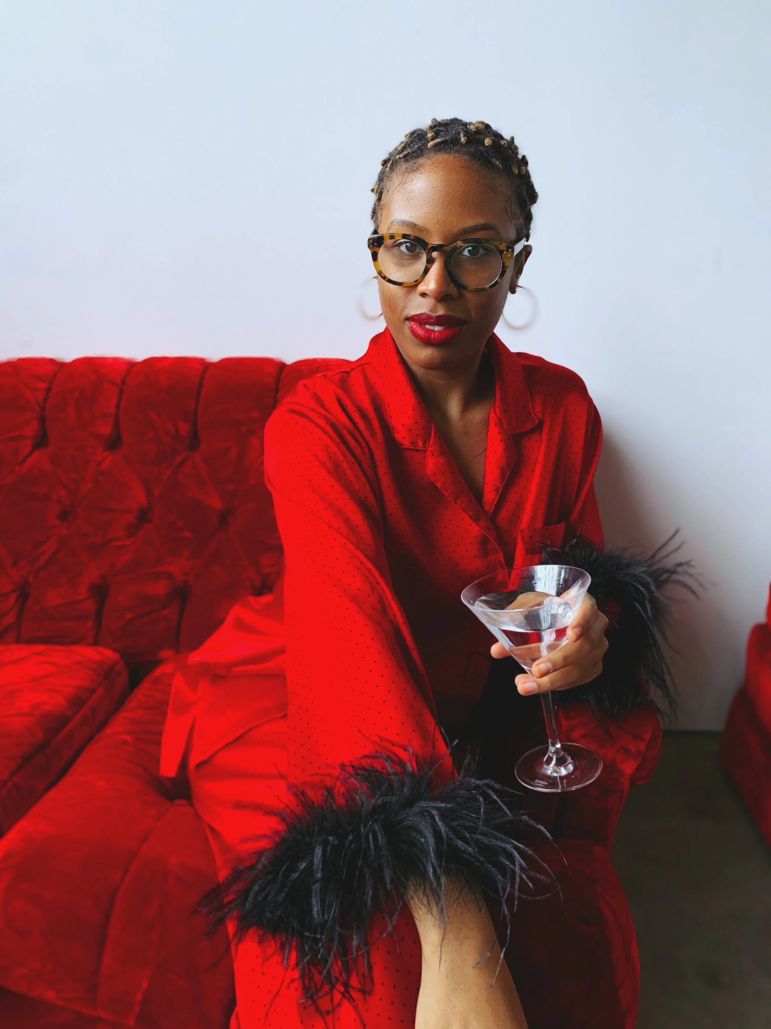 red mules with ostrich feathers