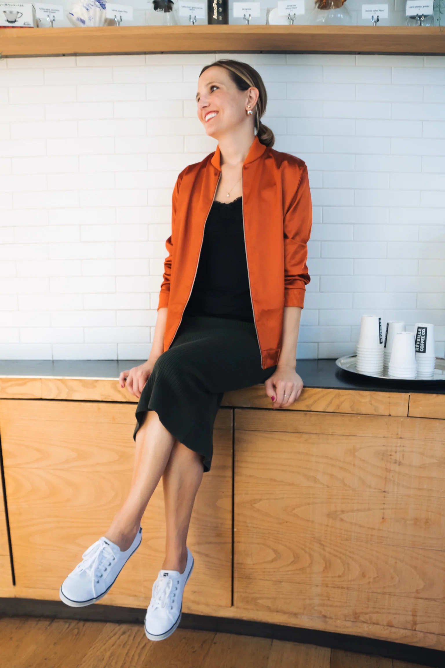 Outfit details: Painted Threads satin bomber ( similar ), Gap ribbed black tank , Topshop knit skirt ( similar ), Ked's sneakers