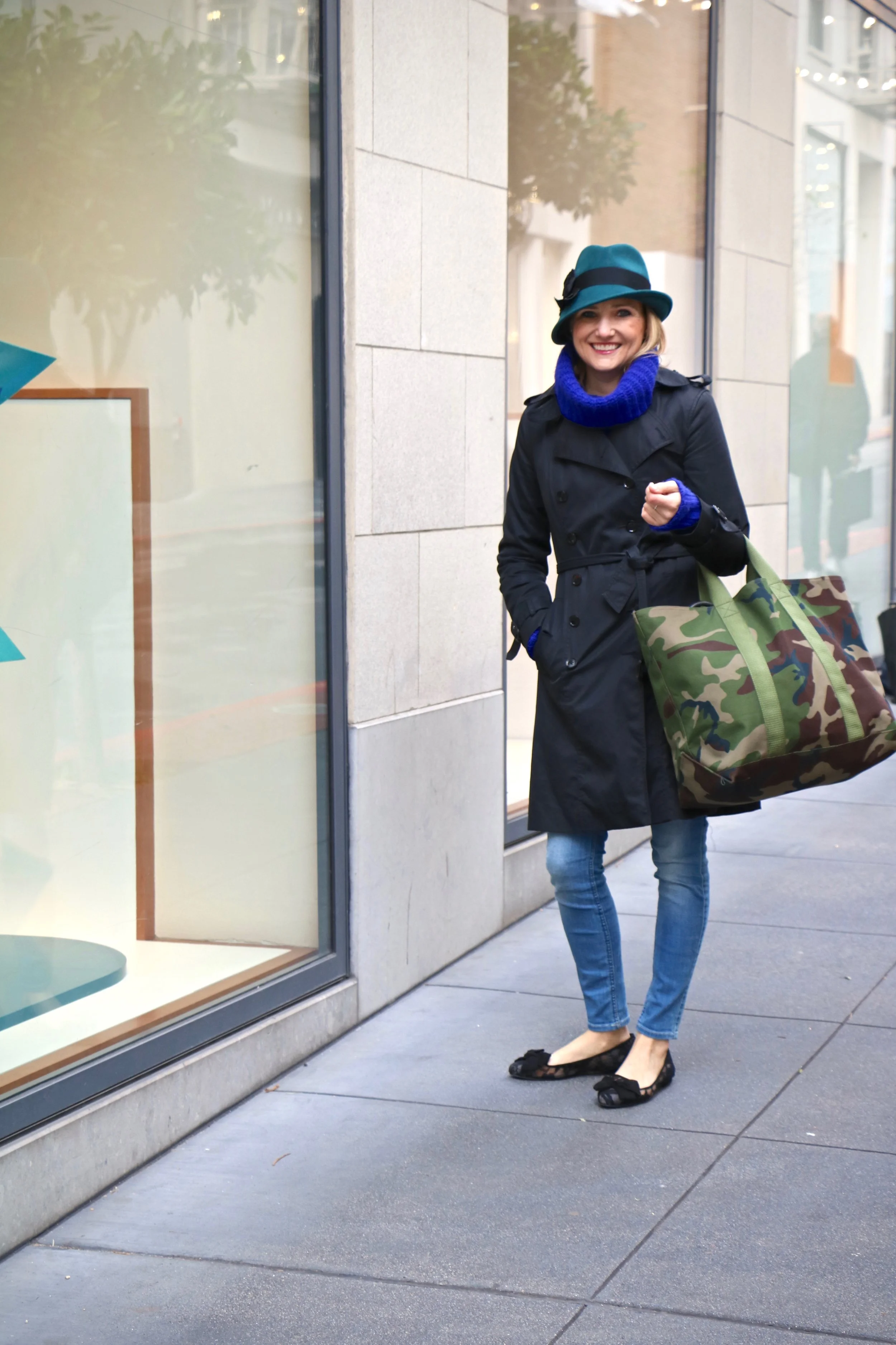 Outfit details: 7 For Mankind denim , Banana Republic cowl neck sweater (last year), Banana Republic black trench coat , Nina black lace shoes , L.L. Bean camo tote , hat from Bloomingdales.