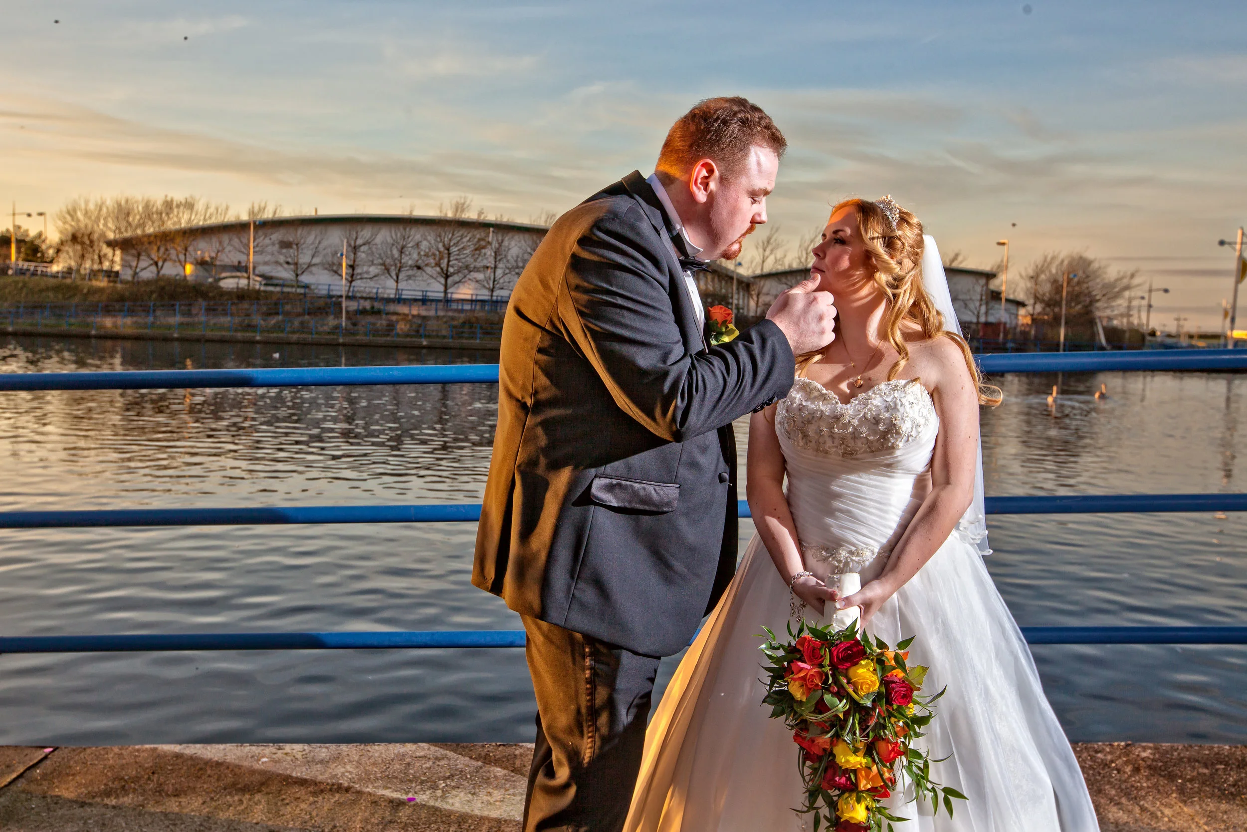 Bride and groom photo taken on Southport promenade on their wedding day ,taken by Avanti Photography based in Blackburn covering Lancashire,Manchester,Merseyside,Cumbria and beyond