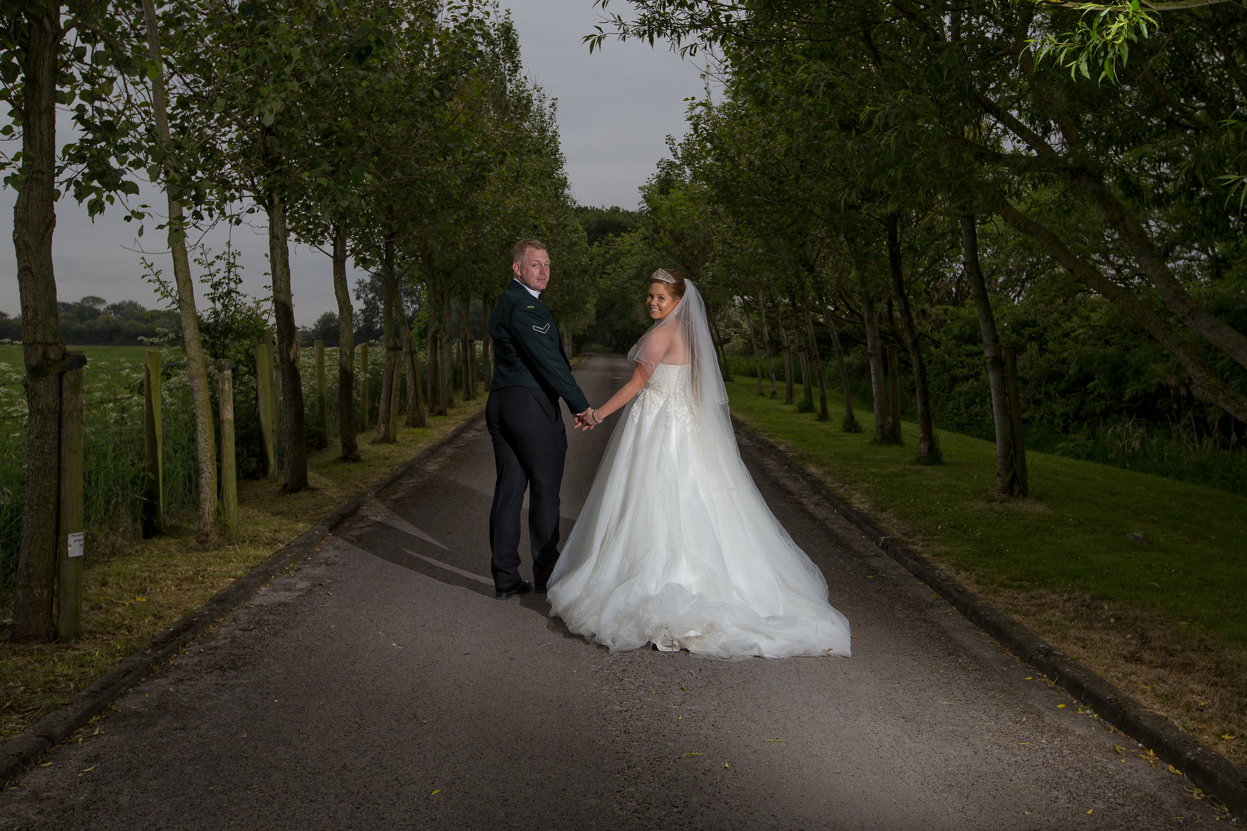 Bride and groom on their wedding day shot at The Great Hall at Mains near Blackpool, 